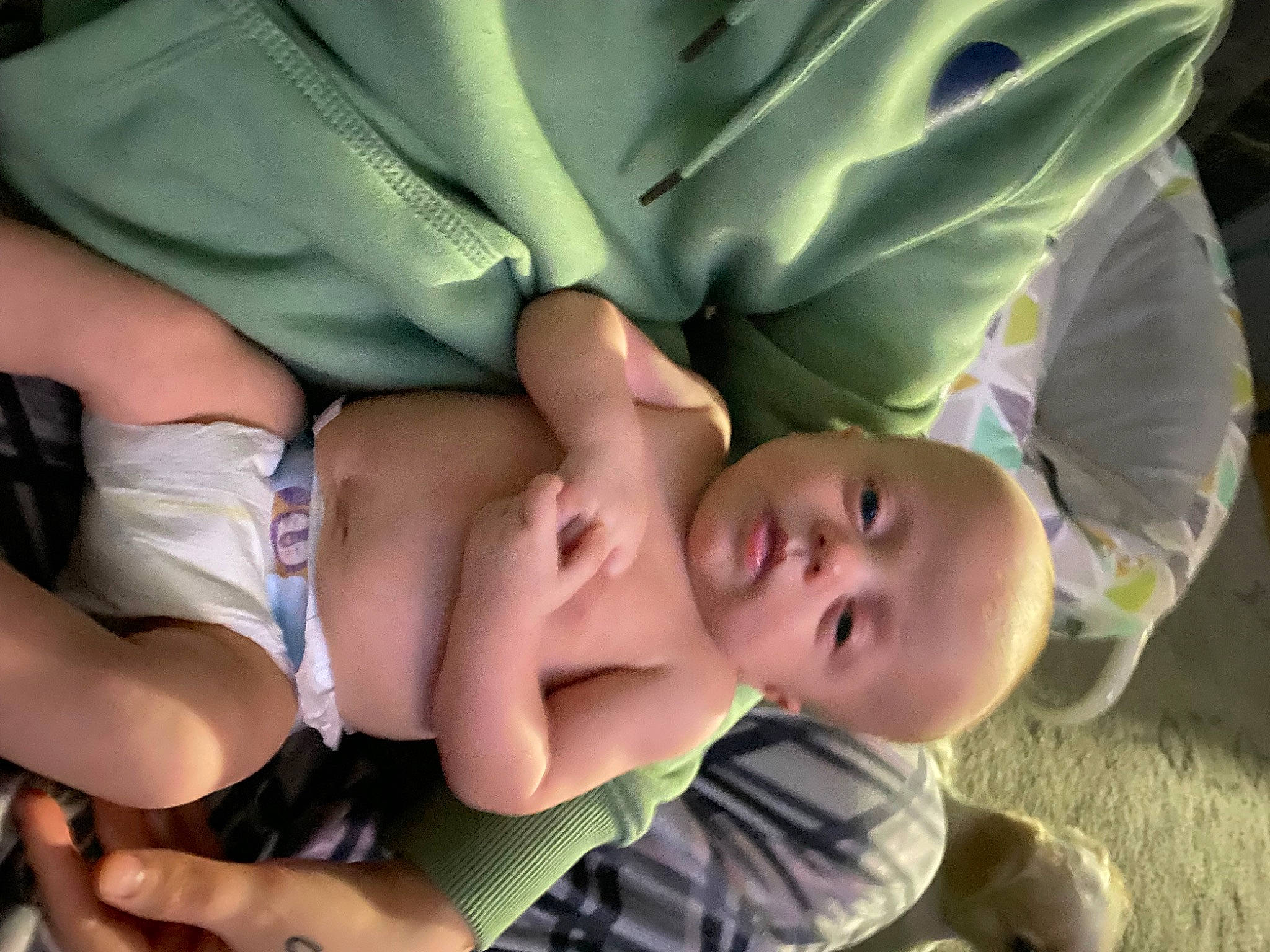 Jaxon is registered to the contest to win money with this photo: baby, baby_toddler_clothing, cheek, comfort, eye, finger, fun, gesture, grass, hand, head, joint, leaf, leg, mouth, person, skin, thigh, thumb, toddler