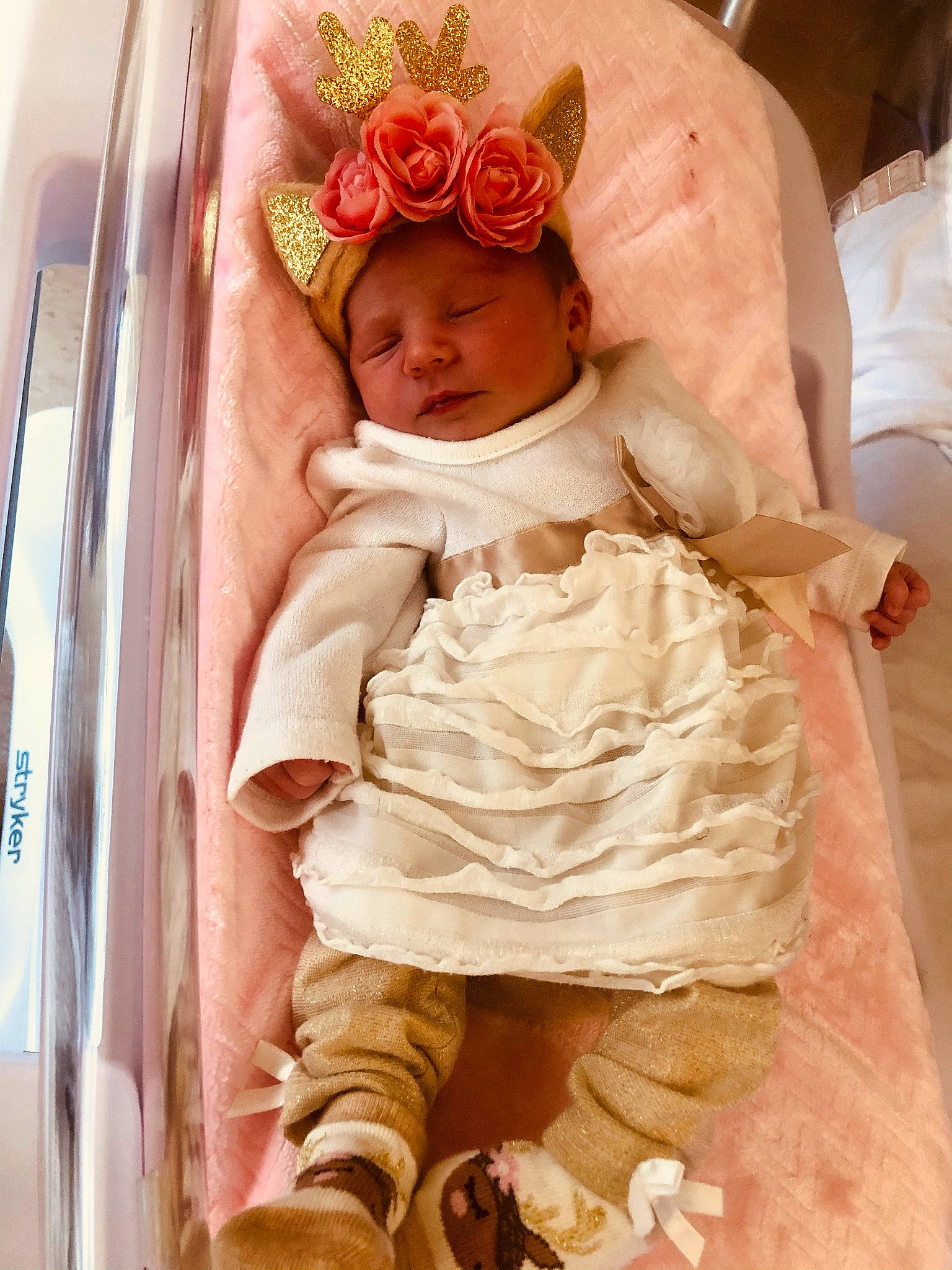 Aurora Iris joined the competition — help win amazing prizes! baby, baby_toddler_clothing, child, comfort, embellishment, event, flower, hair_accessory, headgear, headpiece, human_body, hybrid_tea_rose, peach, person, petal, pink, rose, skin, sleeve, textile