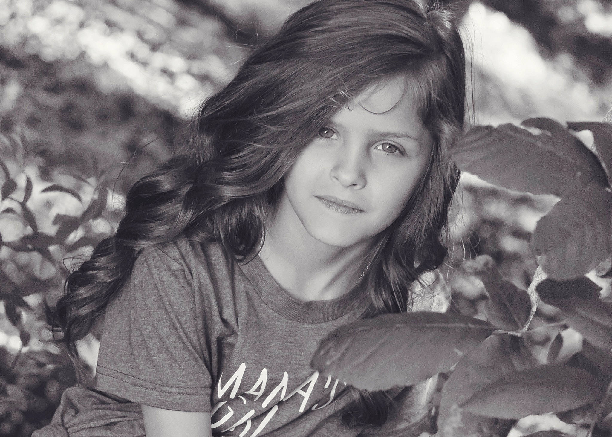 Myah is registered to the contest to win money with this photo: black, black_and_white, black_hair, branch, child, eye, flash_photography, grass, grey, happy, head, iris, lip, long_hair, people_in_nature, person, plant, skin, style, sunlight