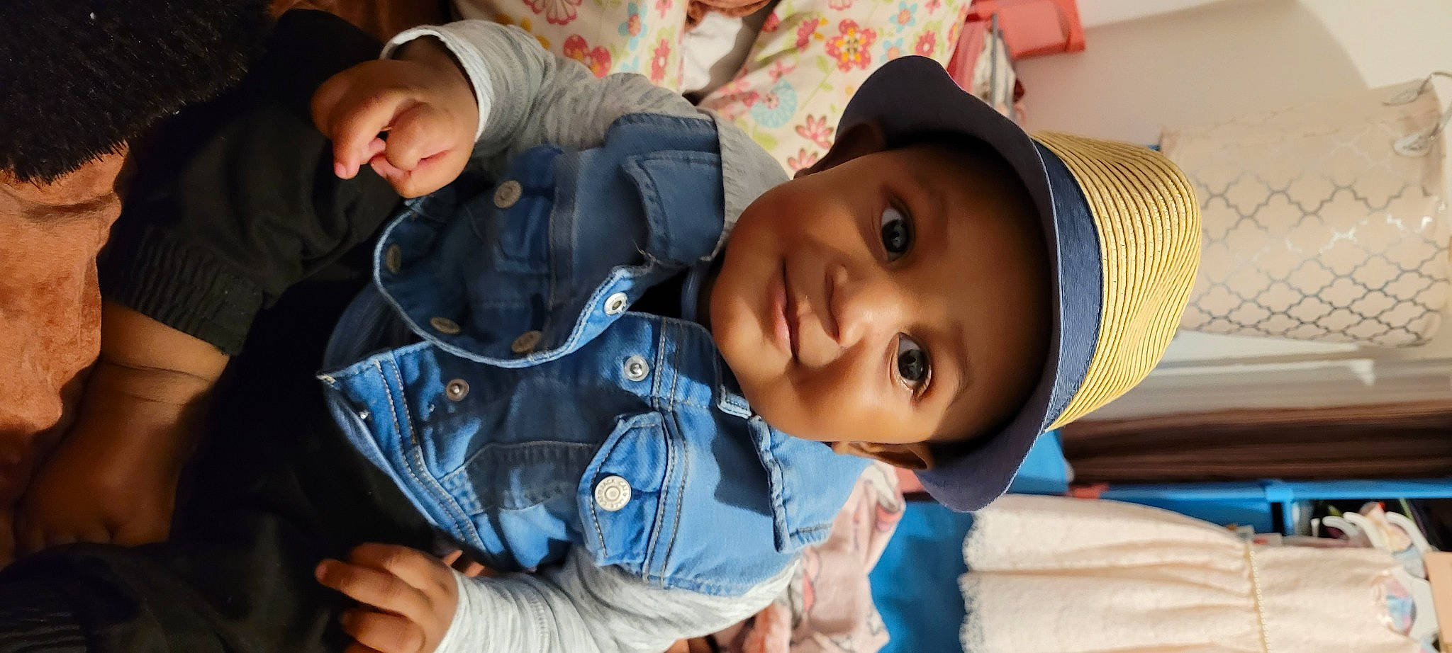 Khai is registered to the contest to win money with this photo: arm, baby, baby_toddler_clothing, cheek, child, comfort, cool, facial_expression, fun, happy, hat, headwear, joy, lip, mouth, nose, person, product, skin, sleeve