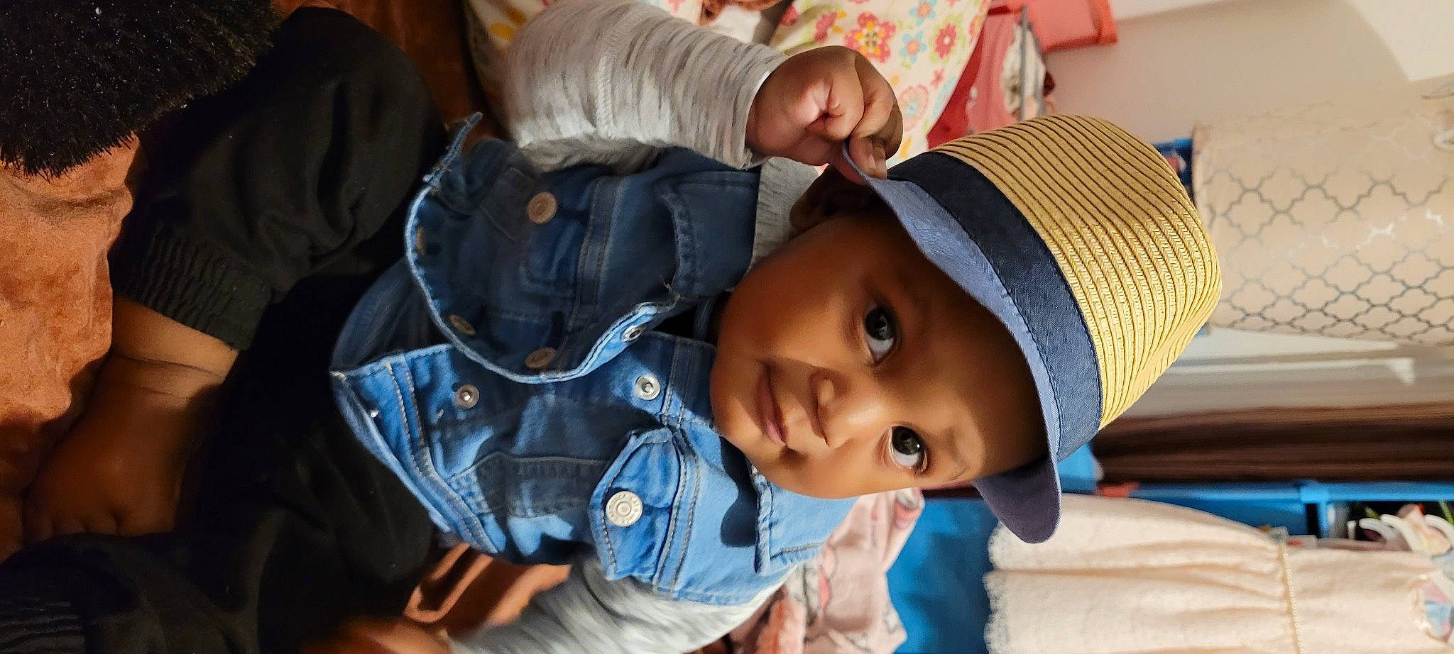Khai joined the competition — help win amazing prizes! baby, baby_products, baby_toddler_clothing, beanie, cap, cheek, child, comfort, fashion_accessory, fun, hat, headwear, lip, nose, person, portrait_photography, sitting, skin, sun_hat, toddler