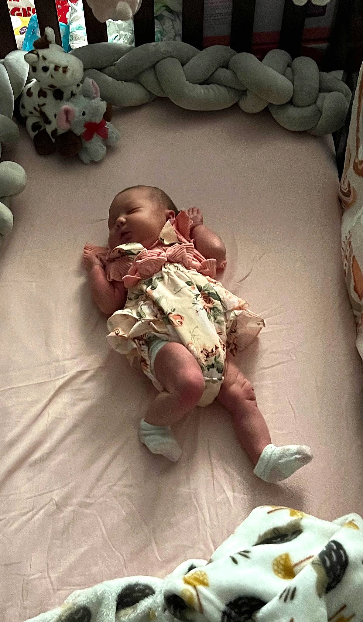 Beckett is registered to the contest to win money with this photo: baby, baby_products, baby_toys, bedding, child, comfort, comfort_food, flesh, flooring, foot, fun, human_body, linens, person, room, sandal, sitting, textile, toddler, toy