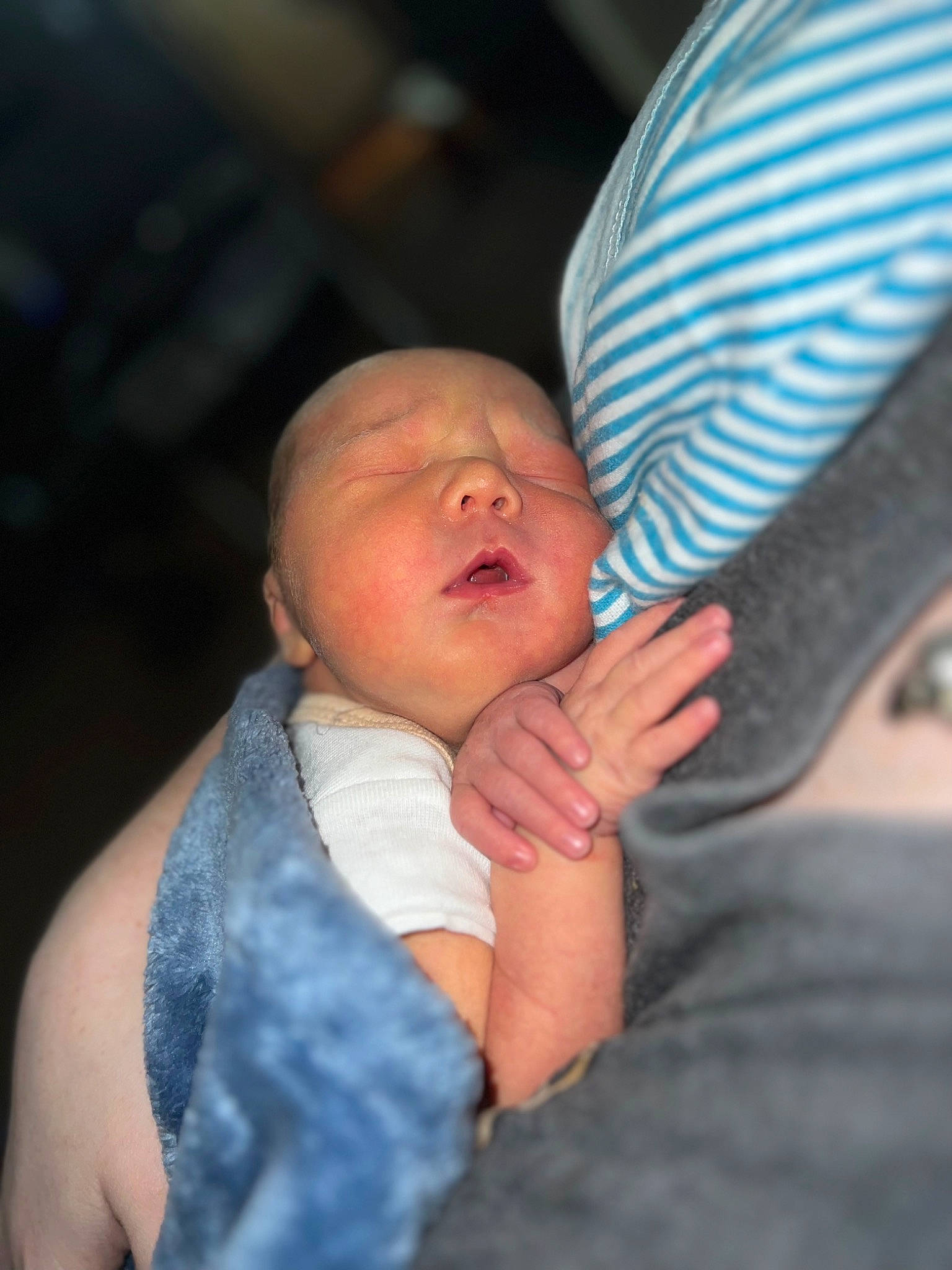 Beckett is registered to the contest to win money with this photo: abdomen, baby, baby_products, baby_toddler_clothing, cheek, child, comfort, elbow, electric_blue, eye, fun, gesture, human_body, nail, person, sitting, thumb, toddler, tree, trunk