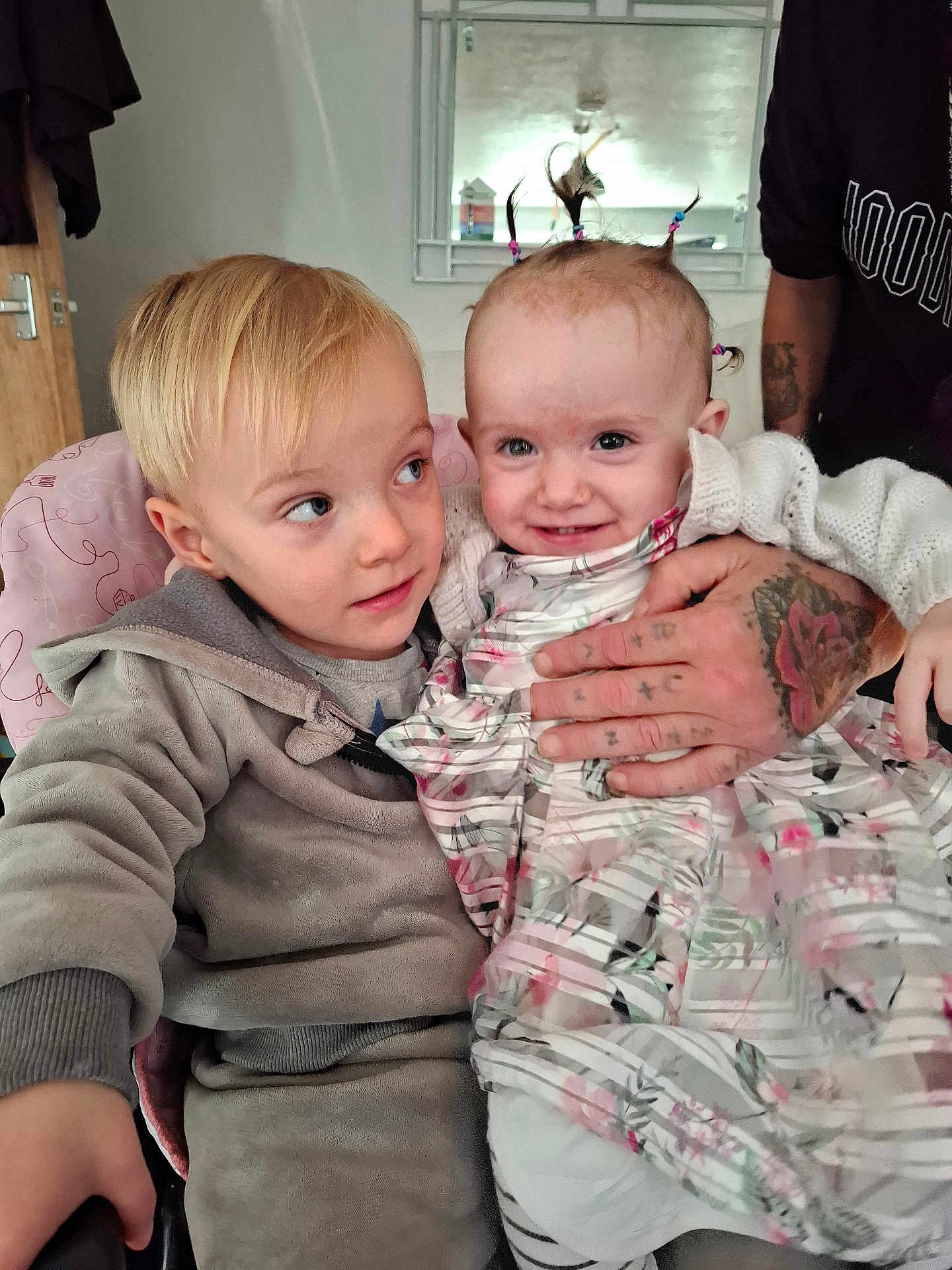 Phoebe-May joined the competition — help win amazing prizes! child, children, baby, toddler, cute, smile, happy, face, hair, pigtails, dress, hoodie, hand, tattoo, indoor, mirror, furniture, person, family, home