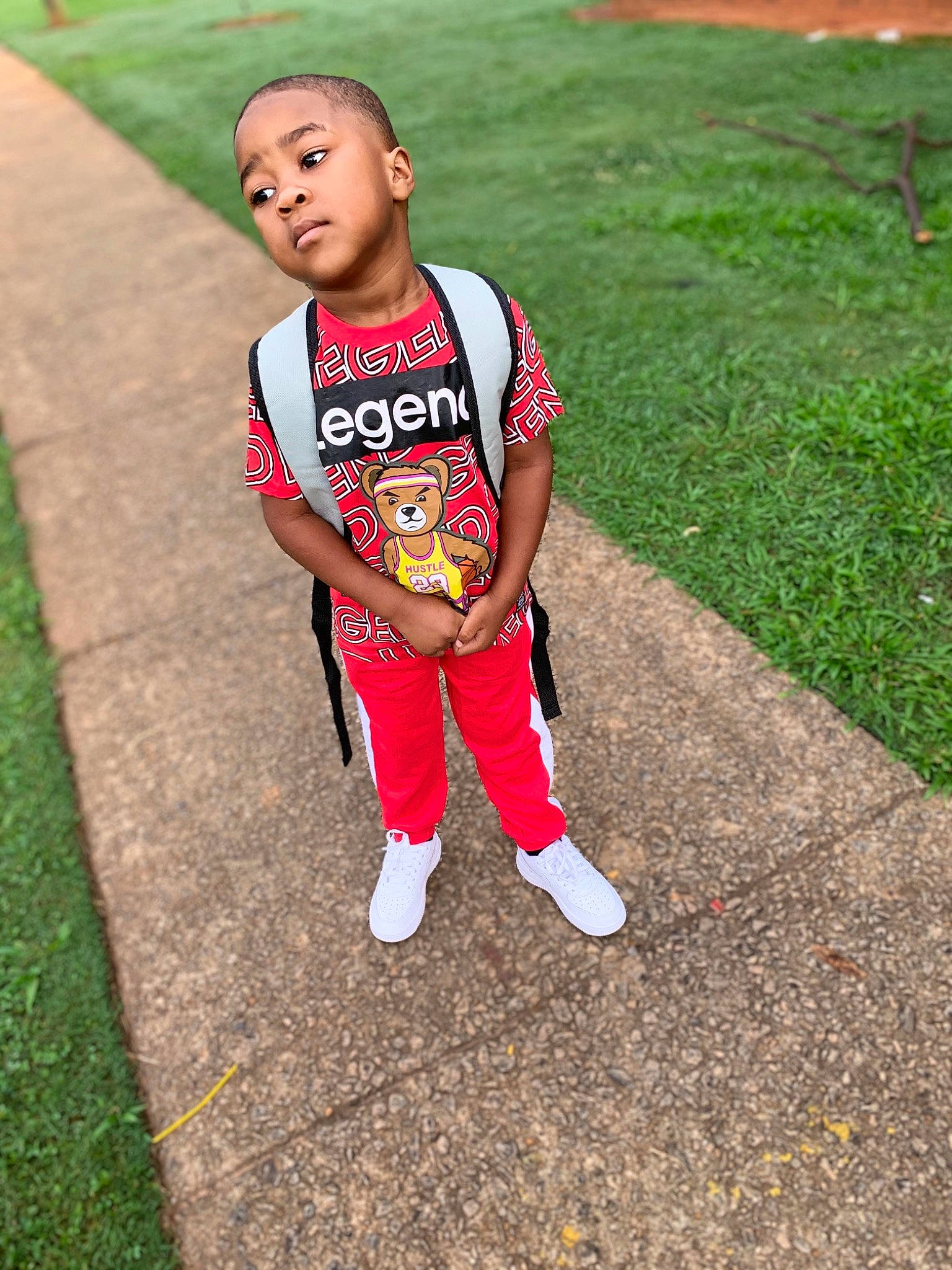 Kyree joined the competition — help win amazing prizes! asphalt, competition_event, eye, face, flooring, grass, green, happy, head, lawn, leisure, people_in_nature, person, plant, recreation, sleeve, sportswear, t_shirt, thigh, toddler