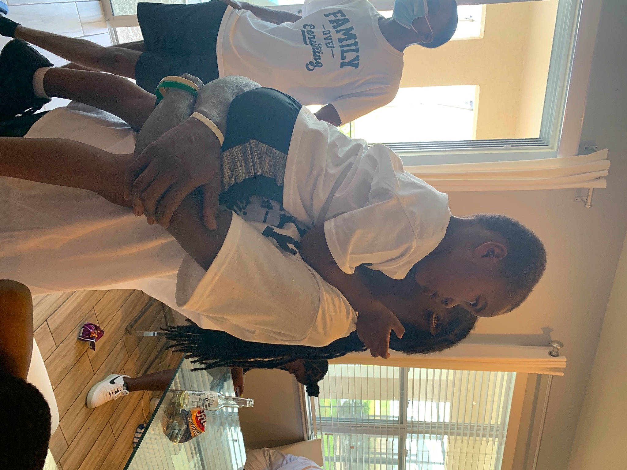 Kyree is registered to the contest to win money with this photo: comfort, elbow, fun, hat, knee, leisure, person, room, sitting, thigh, under_exposed, white, window, world