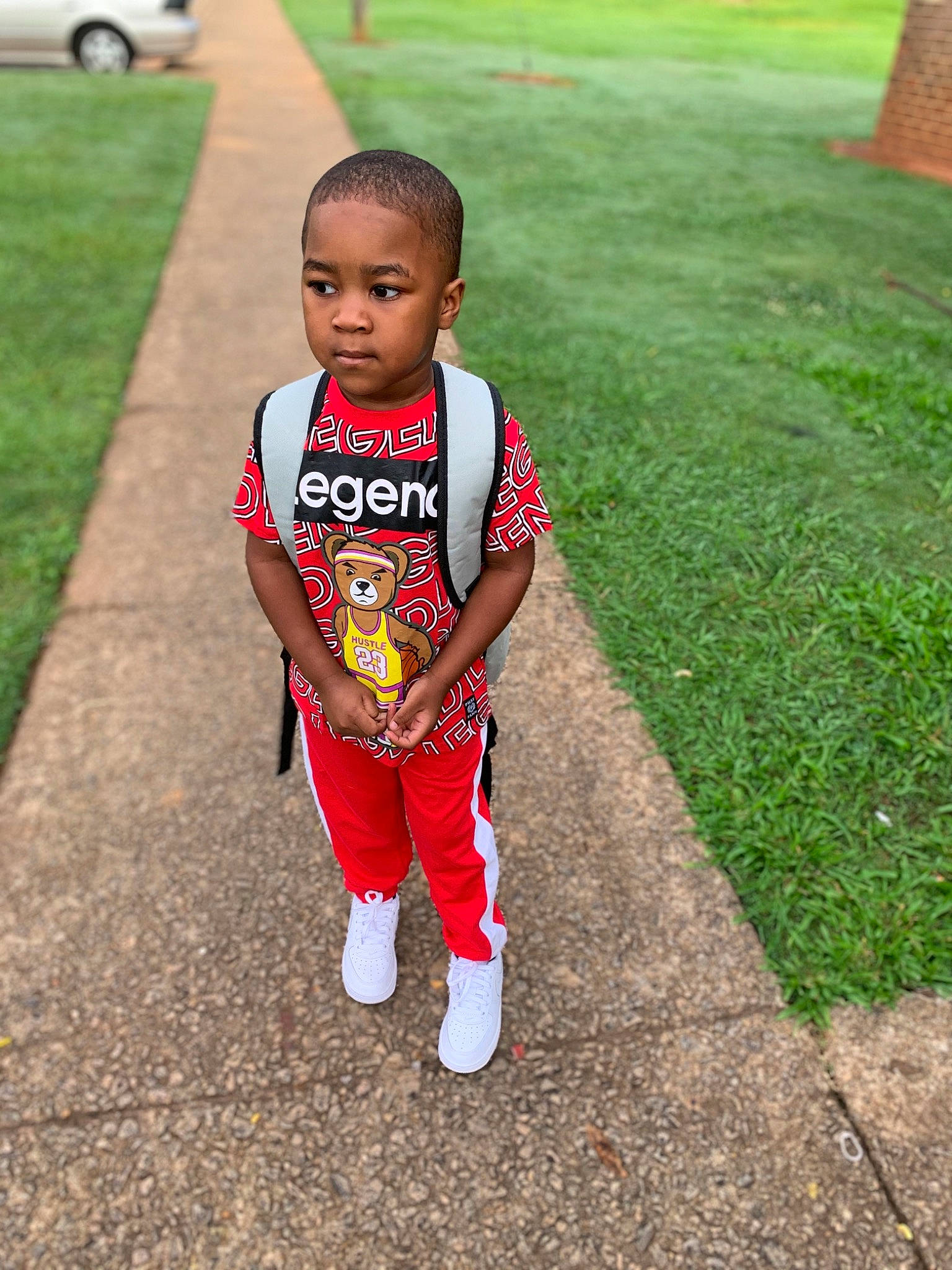 Kyree joined the competition — help win amazing prizes! asphalt, baby, baby_toddler_clothing, flooring, grass, happy, head, leaf, leg, leisure, people_in_nature, person, plant, recreation, road, shoe, sidewalk, sleeve, t_shirt, toddler