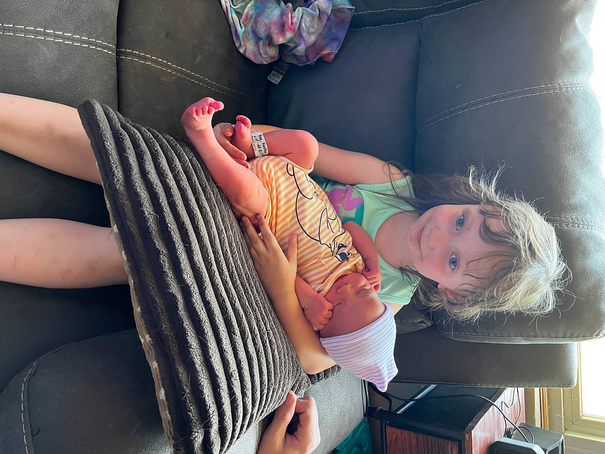 Hudson is registered to the contest to win money with this photo: abdomen, black_hair, comfort, cool, denim, dress, elbow, eyewear, hairstyle, human_leg, jewellery, joint, joy, knee, nail, person, shoulder, sleeve, thigh, trunk