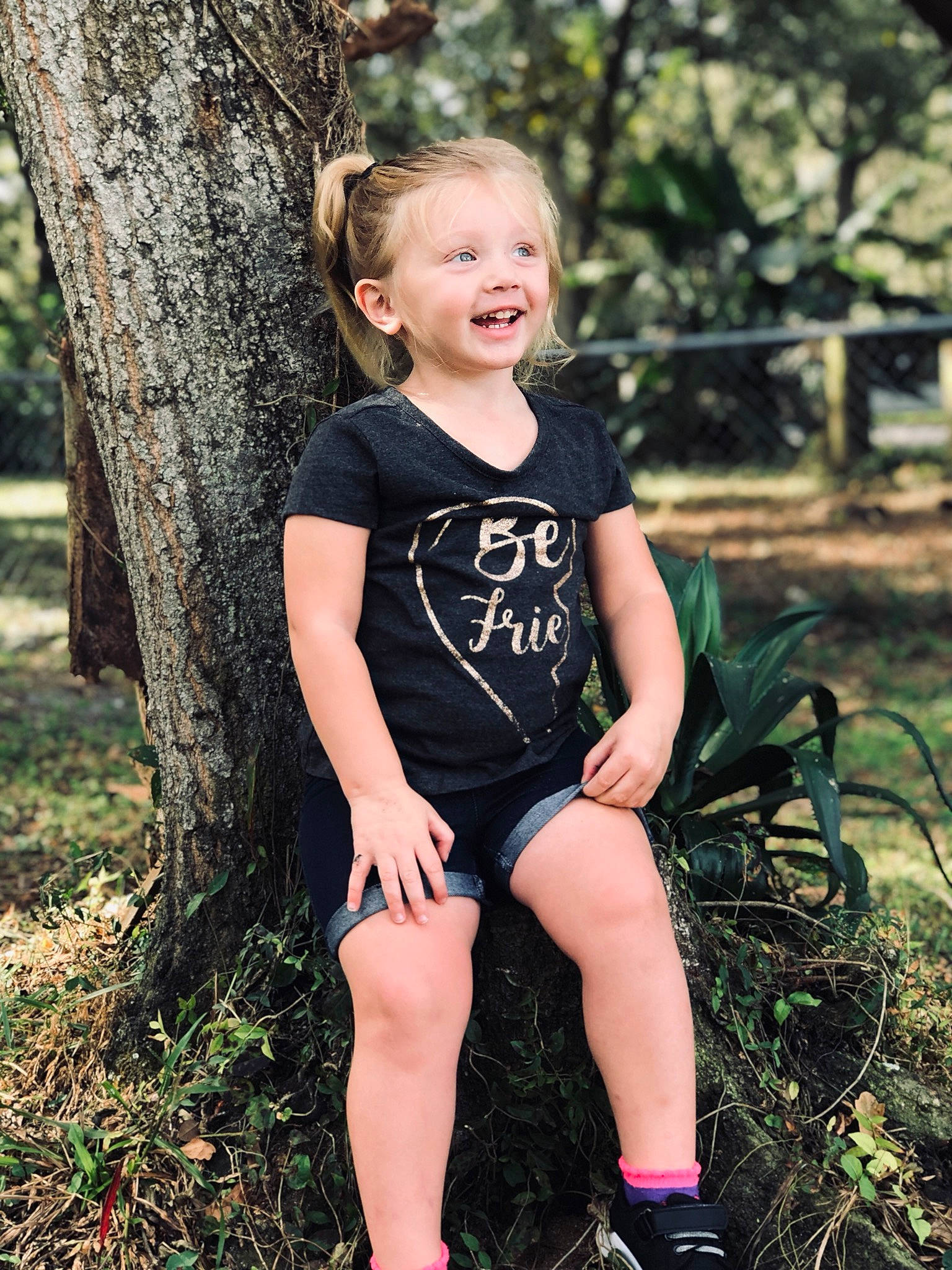 Dakotah joined the competition — help win amazing prizes! blond, child, child_model, dress, footwear, forest, grass, happy, joy, leg, long_hair, people_in_nature, person, photo_shoot, photography, plant, shorts, sitting, smile, style