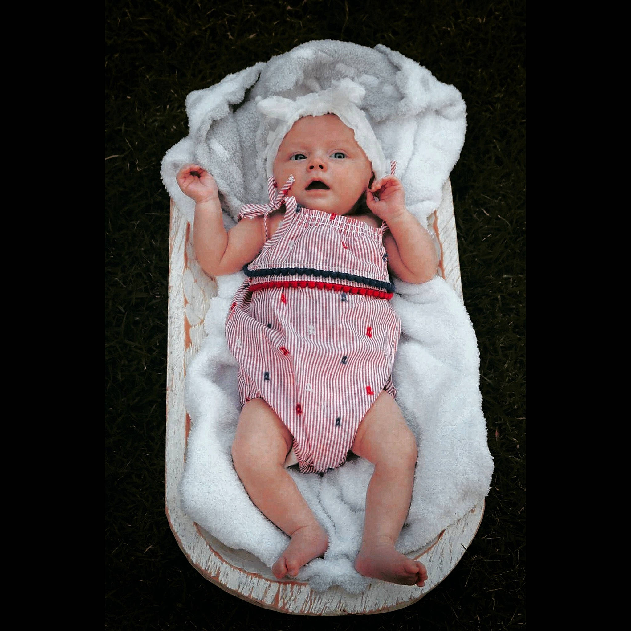 Riley joined the competition — help win amazing prizes! arm, baby, baby_toddler_clothing, cheek, chin, collar, comfort, doll, dress, eyelash, foot, head, headwear, human_body, iris, leg, linens, lip, pattern, person