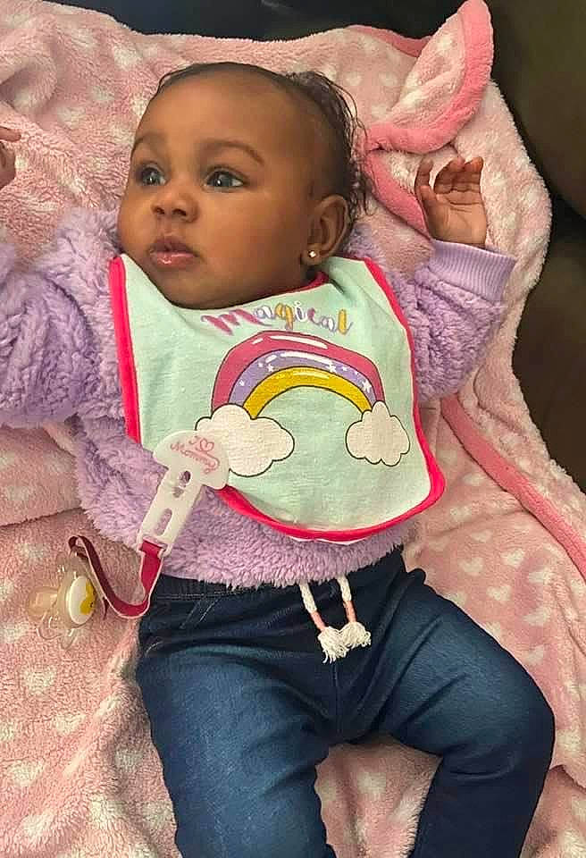 Kelani joined the competition — help win amazing prizes! baby, baby_products, baby_toddler_clothing, cheek, child, eye, happy, head, human_body, iris, lip, neck, nose, person, pink, skin, sleeve, textile, thigh, toddler