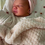 Lyna participe au concours pour gagner de l'argent avec cette photo : baby, bear_patch, blanket, child, clothing, cozy, cute, face, headband, indoors, infant, newborn, pacifier, peaceful, pink, portrait, resting, sleeping, soft_texture, wrapped
