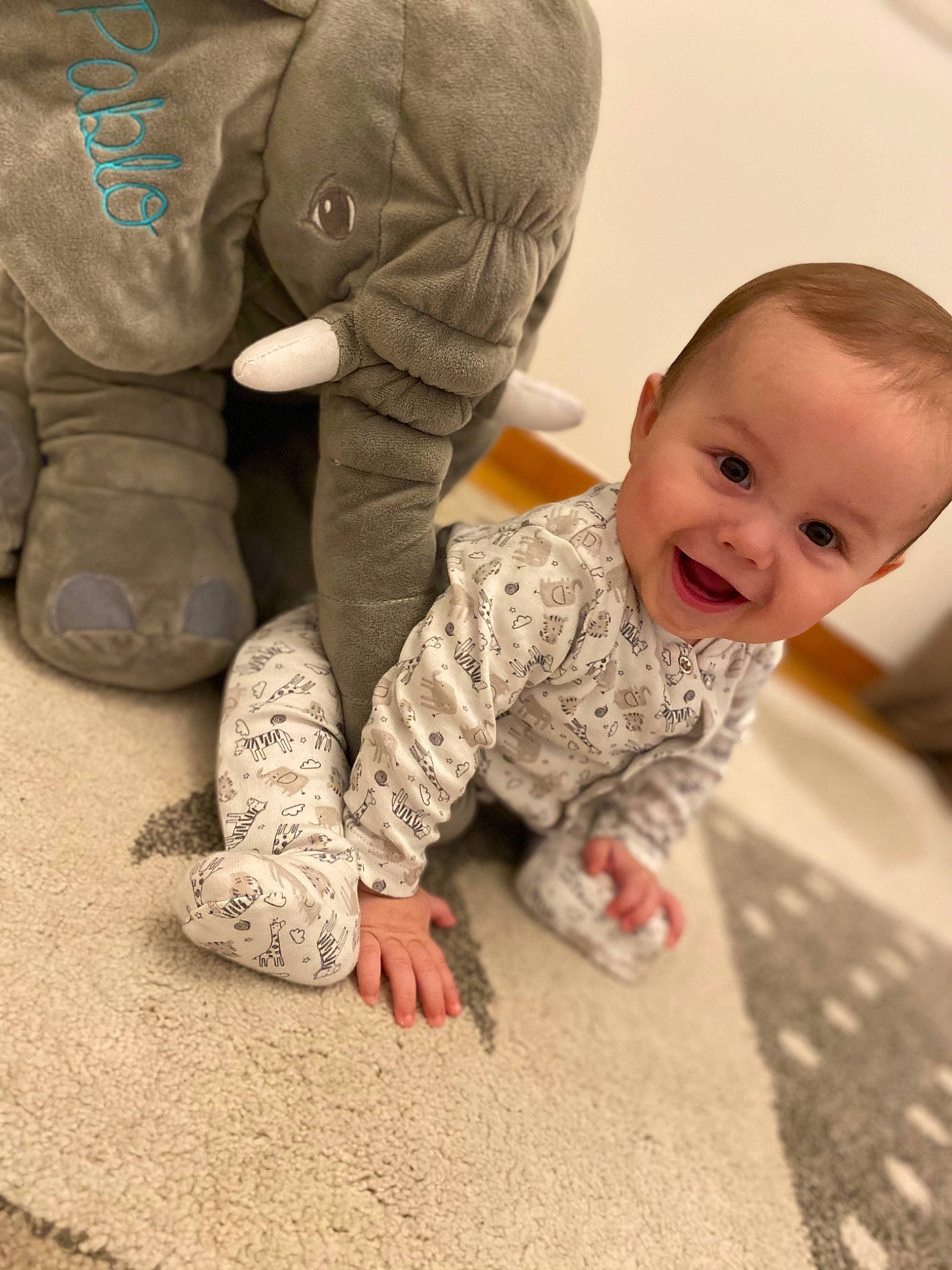 Pablo participe au concours pour gagner de l'argent avec cette photo : baby_toddler_clothing, child, comfort, crawling, finger, floor, flooring, gesture, happy, joint, mammal, nose, person, product, skin, sleeve, smile, toddler, tummy_time, vertebrate