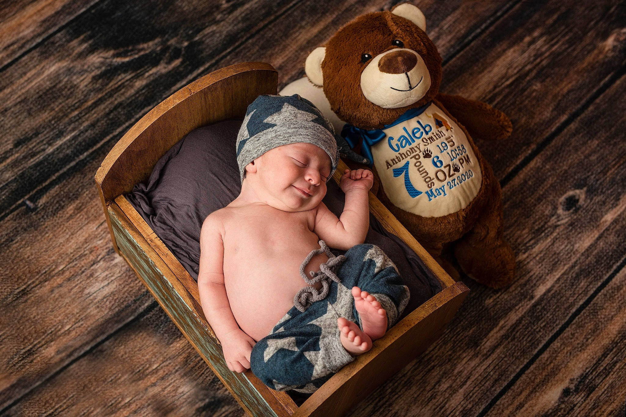 Caleb is registered to the contest to win money with this photo: baby, baby_products, brown, cap, child, headwear, person, photography, product, toddler, wood