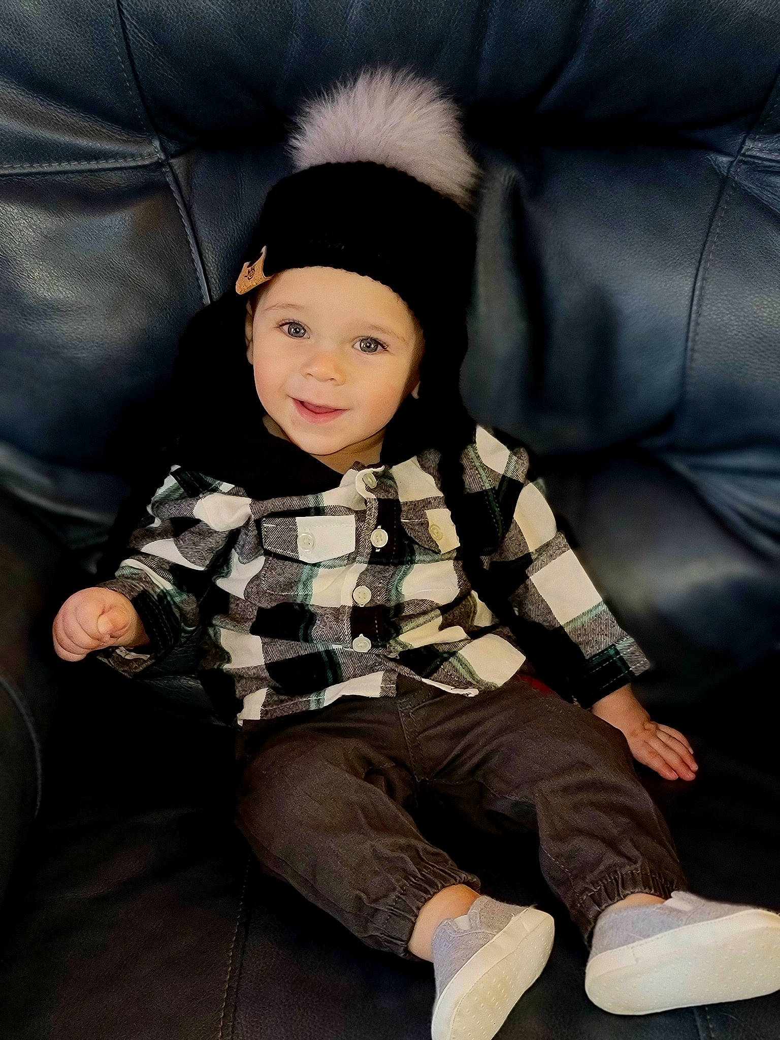 Kreed is registered to the contest to win money with this photo: black_hair, cap, cheek, child, comfort, cool, eye, flash_photography, fun, happy, head, headwear, human_body, joy, person, sitting, skin, sleeve, smile, tartan