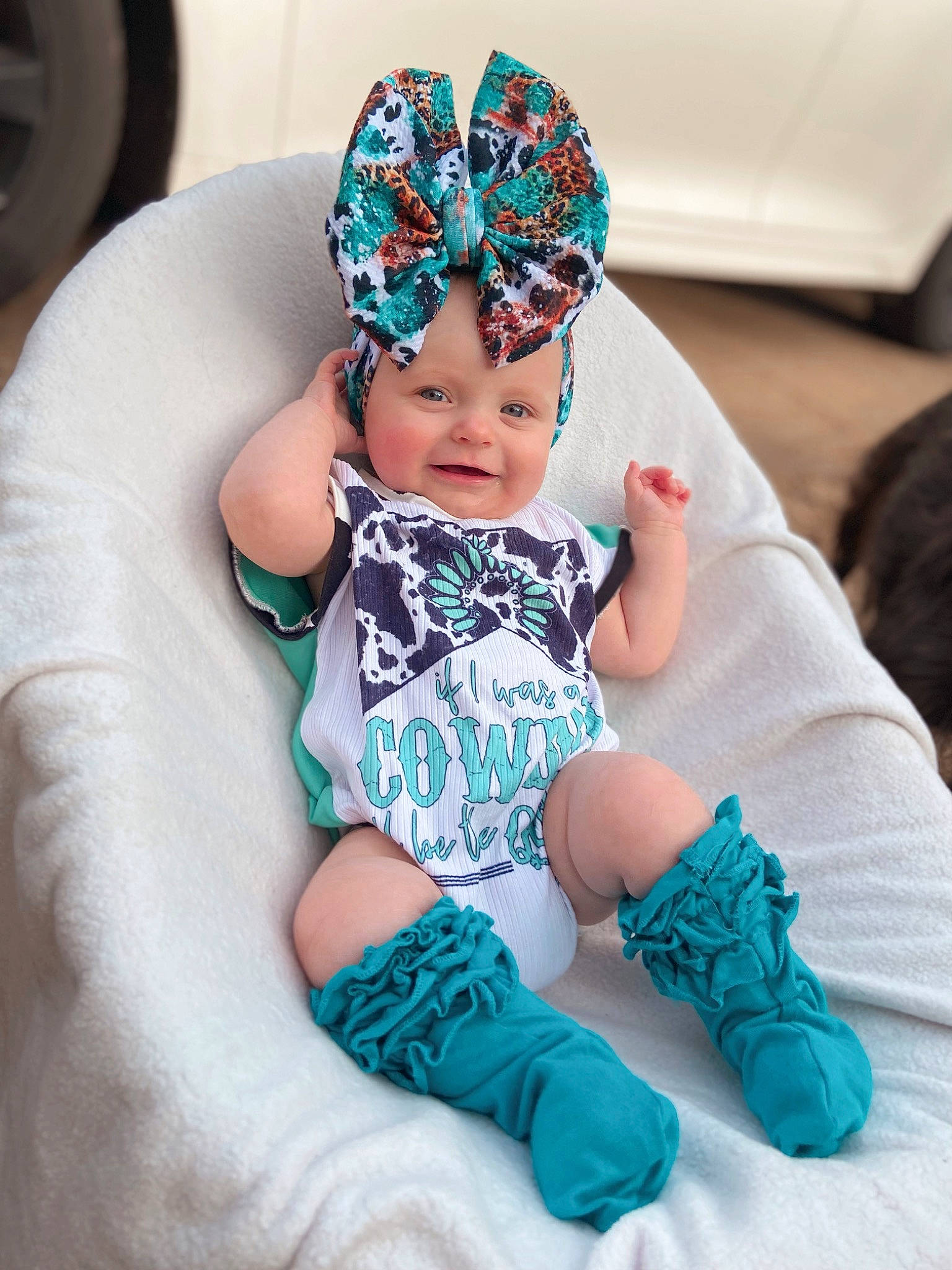 Kinzley joined the competition — help win amazing prizes! baby, baby_toddler_clothing, beanie, cap, child, electric_blue, fashion_accessory, foot, hair_accessory, happy, hat, headband, headpiece, headwear, jewellery, pattern, person, purple, sleeve, sock