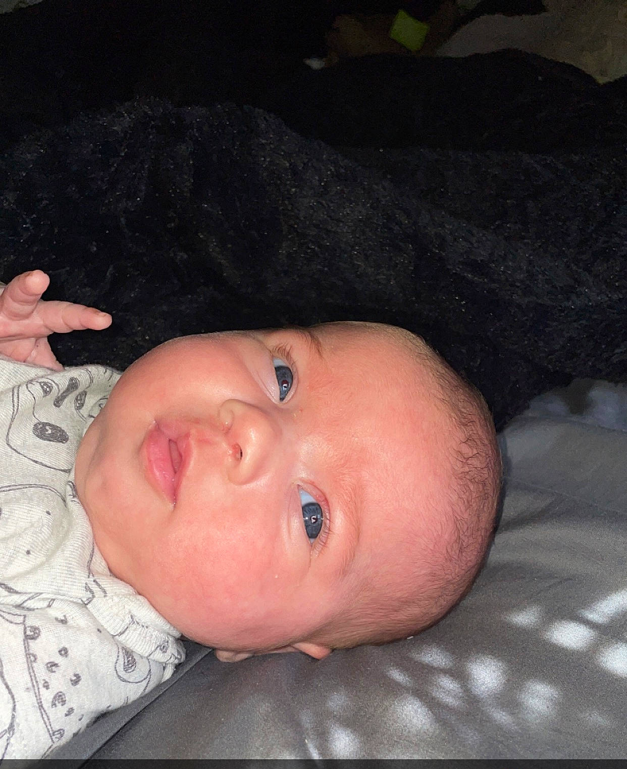 Marcella is registered to the contest to win money with this photo: baby, baby_toddler_clothing, cheek, child, comfort, ear, eye, eyelash, fur, happy, head, human_body, iris, lip, nose, person, portrait_photography, skin, smile, thumb