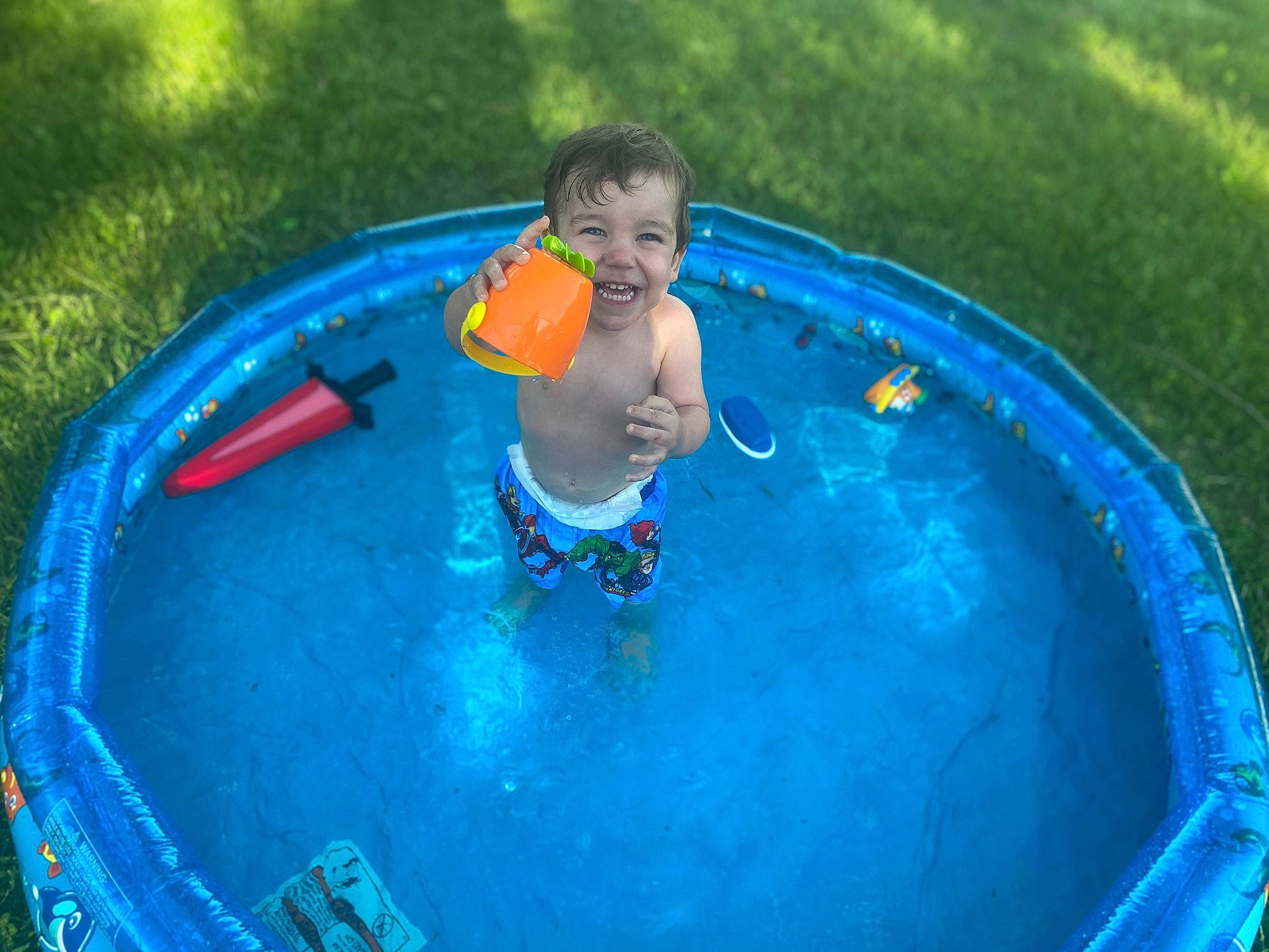 Zeke is registered to the contest to win money with this photo: child, fun, joy, leisure, person, play, recreation, summer, swimming_pool, water