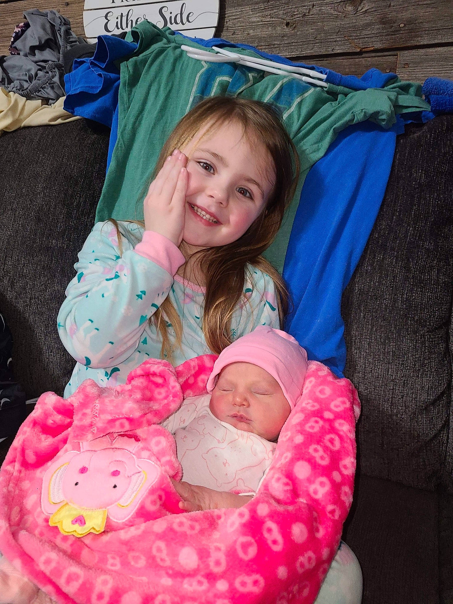 Harleigh joined the competition — help win amazing prizes! baby, baby_carriage, baby_products, baby_toddler_clothing, blue, child, comfort, event, face, fun, green, happy, headwear, joy, lap, linens, person, photograph, pink, skin