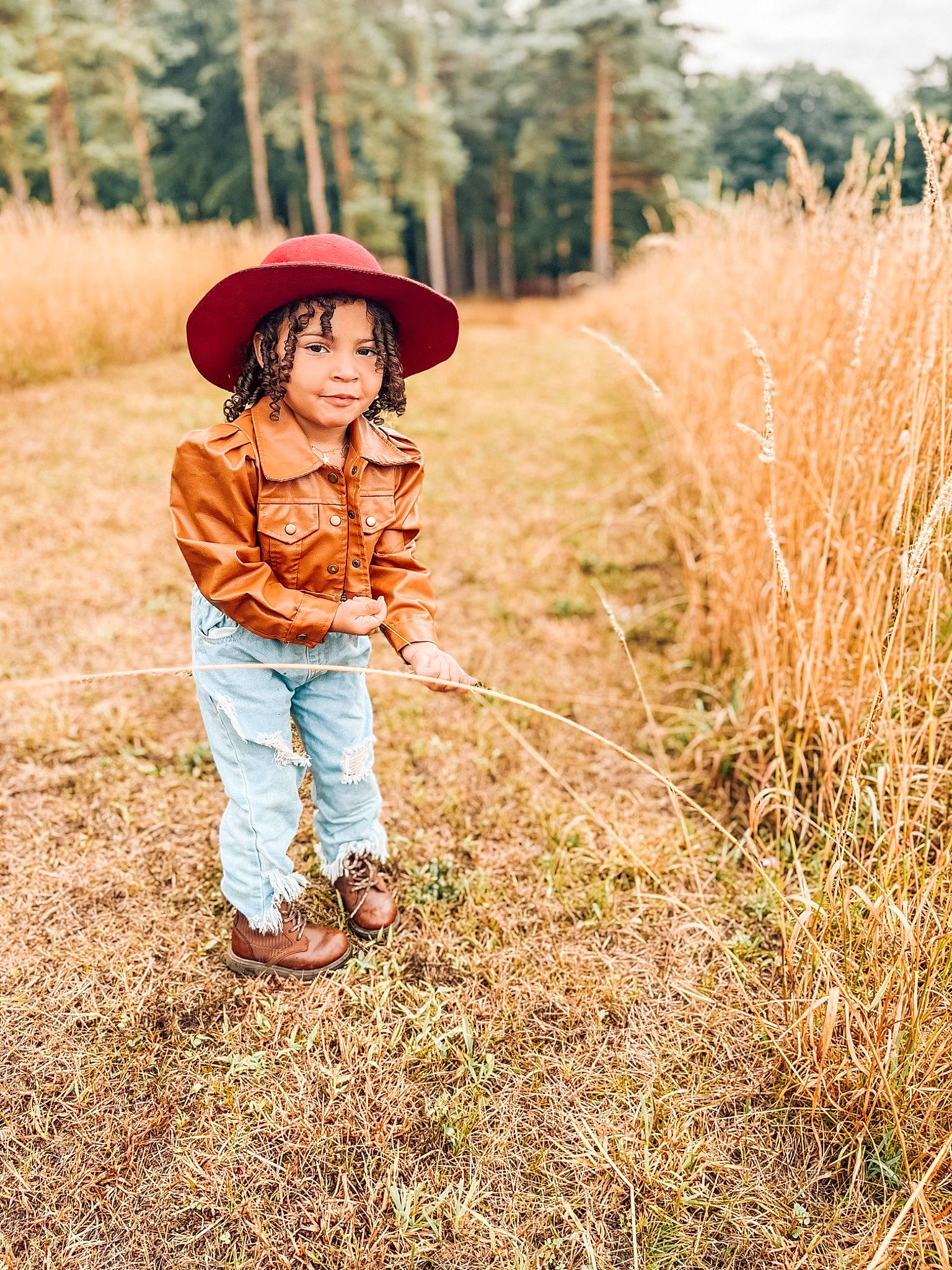 Haven joined the competition — help win amazing prizes! cap, flash_photography, grass, grass_family, grassland, happy, hat, headgear, headwear, landscape, leaf, natural_landscape, people_in_nature, person, plant, prairie, rural_area, sun_hat, tints_and_shades, toddler