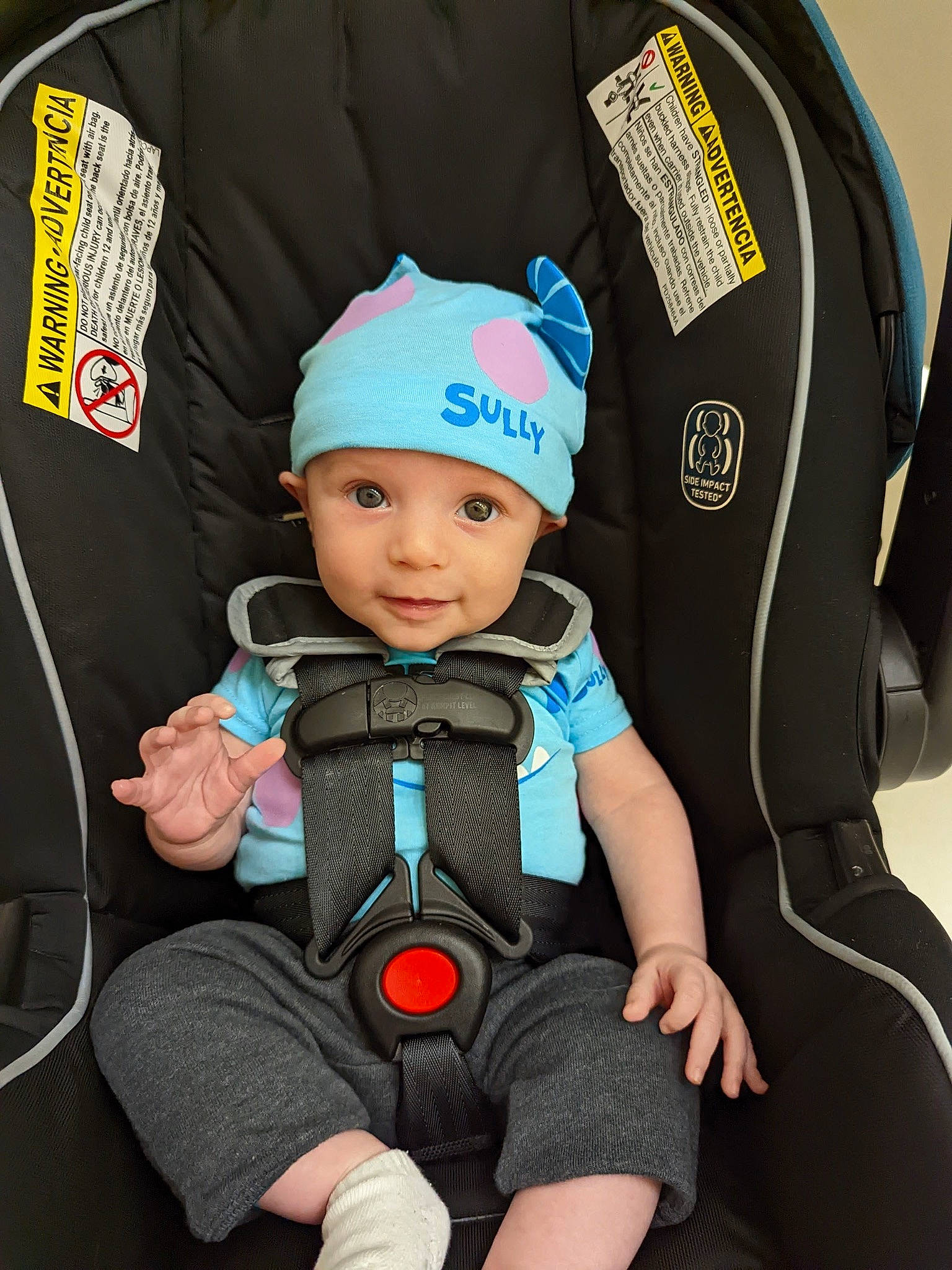 Bradley is registered to the contest to win money with this photo: auto_part, baby, baby_carriage, baby_in_car_seat, baby_products, baby_safety, baby_toddler_clothing, beanie, cap, car_seat, child, comfort, electric_blue, fashion_accessory, fun, headwear, person, personal_protective_equipment, seat_belt, sitting