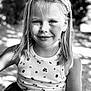 child, girl, portrait, black_and_white, smile, headband, tank_top, outdoor, sunlight, shadow, flower_pattern, young, person, happy, face, hair, casual_clothing, nature, daylight, closeup