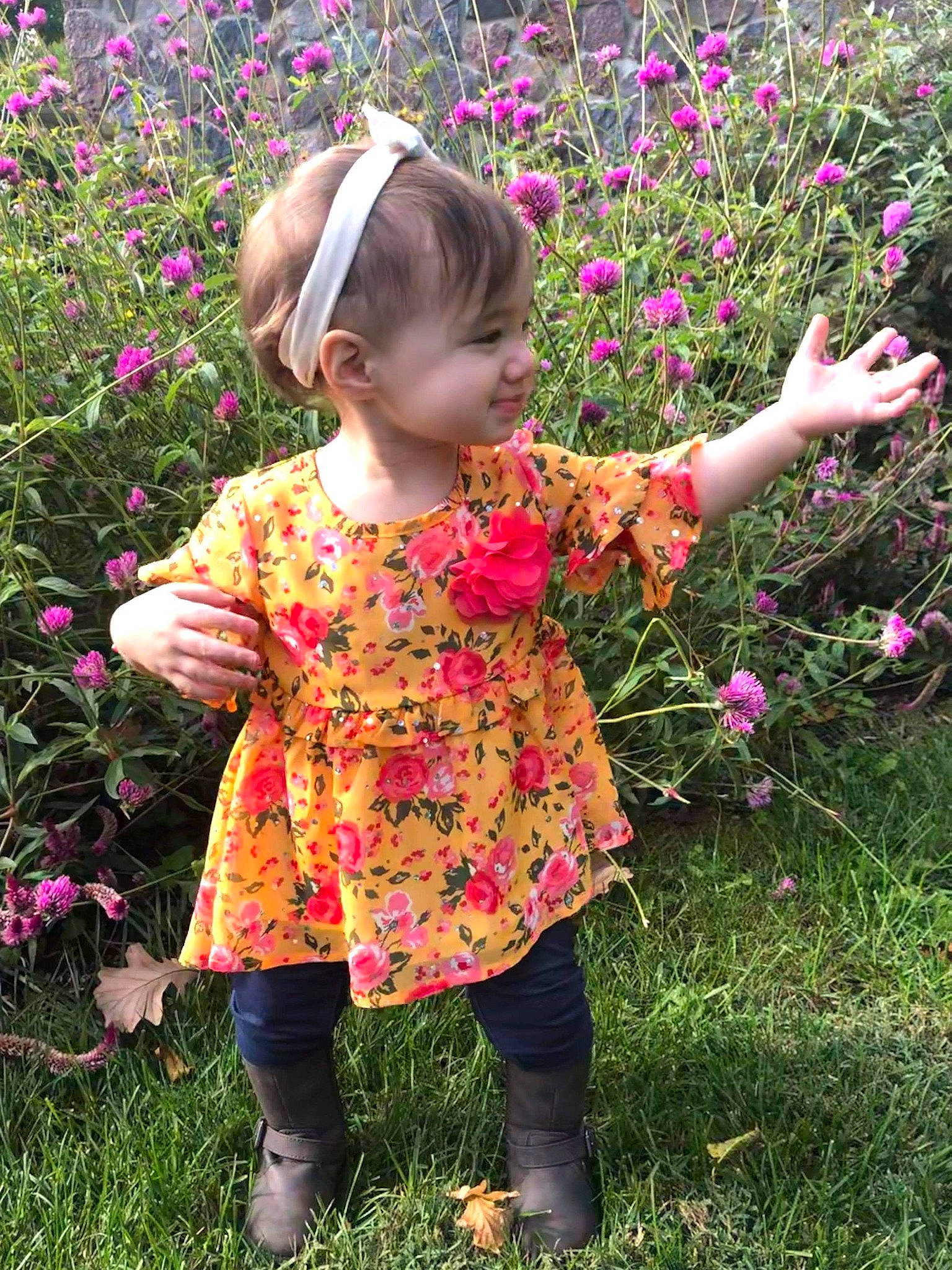 Cordelia is registered to the contest to win money with this photo: annual_plant, botany, child, flower, grass, herbaceous_plant, meadow, pattern, perennial_plant, person, pink, plant, shrub, spring, toddler, wildflower