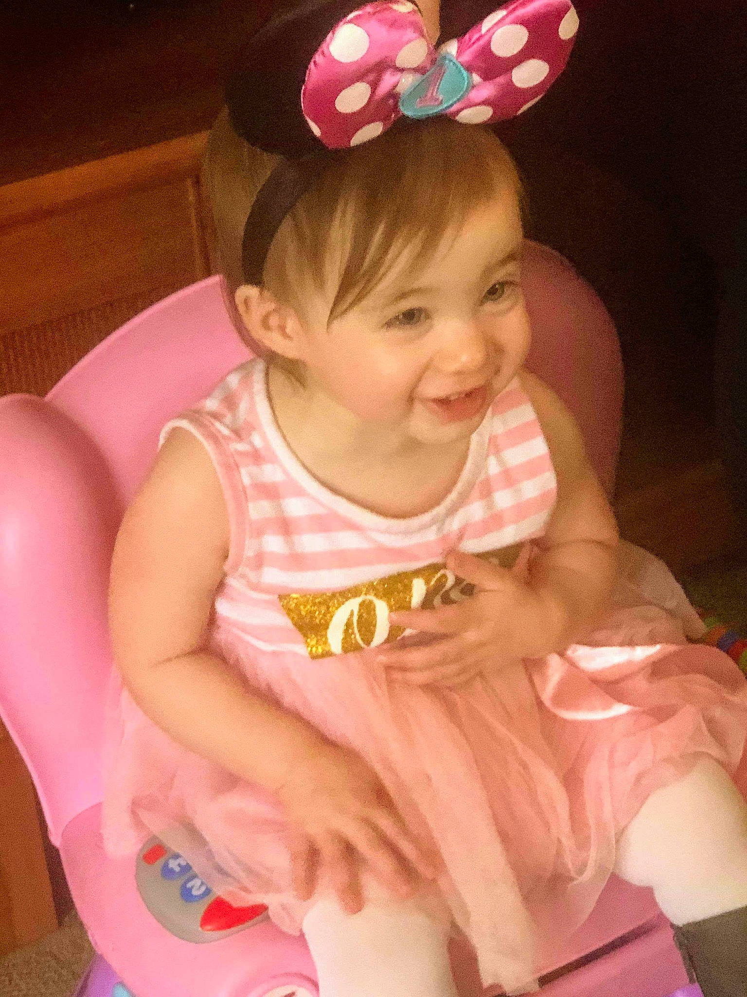 Cordelia is registered to the contest to win money with this photo: baby, baby_toddler_clothing, child, hair_accessory, headband, headgear, joy, person, pink, skin, smile, toddler