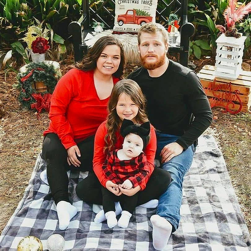 Annika joined the competition — help win amazing prizes! botany, comfort, flowerpot, grass, green, happy, headwear, jeans, joy, lap, leaf, leg, leisure, people, people_in_nature, person, photograph, plant, red, smile