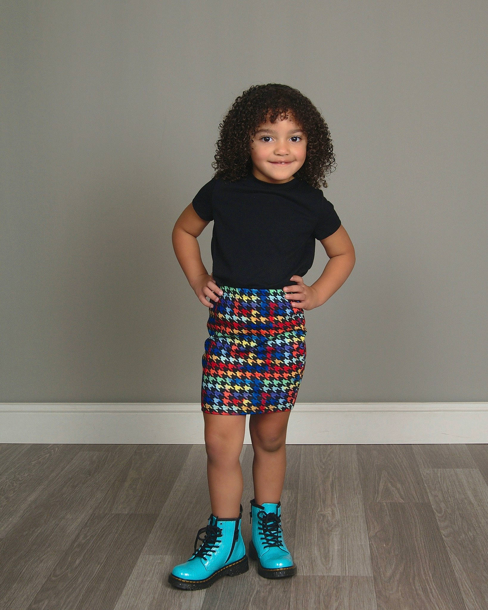 Cadence is registered to the contest to win money with this photo: denim, dress, fashion_design, flash_photography, footwear, joy, knee, leg, neck, person, plaid, shorts, sleeve, sneakers, sock, sportswear, t_shirt, tartan, thigh, trunk