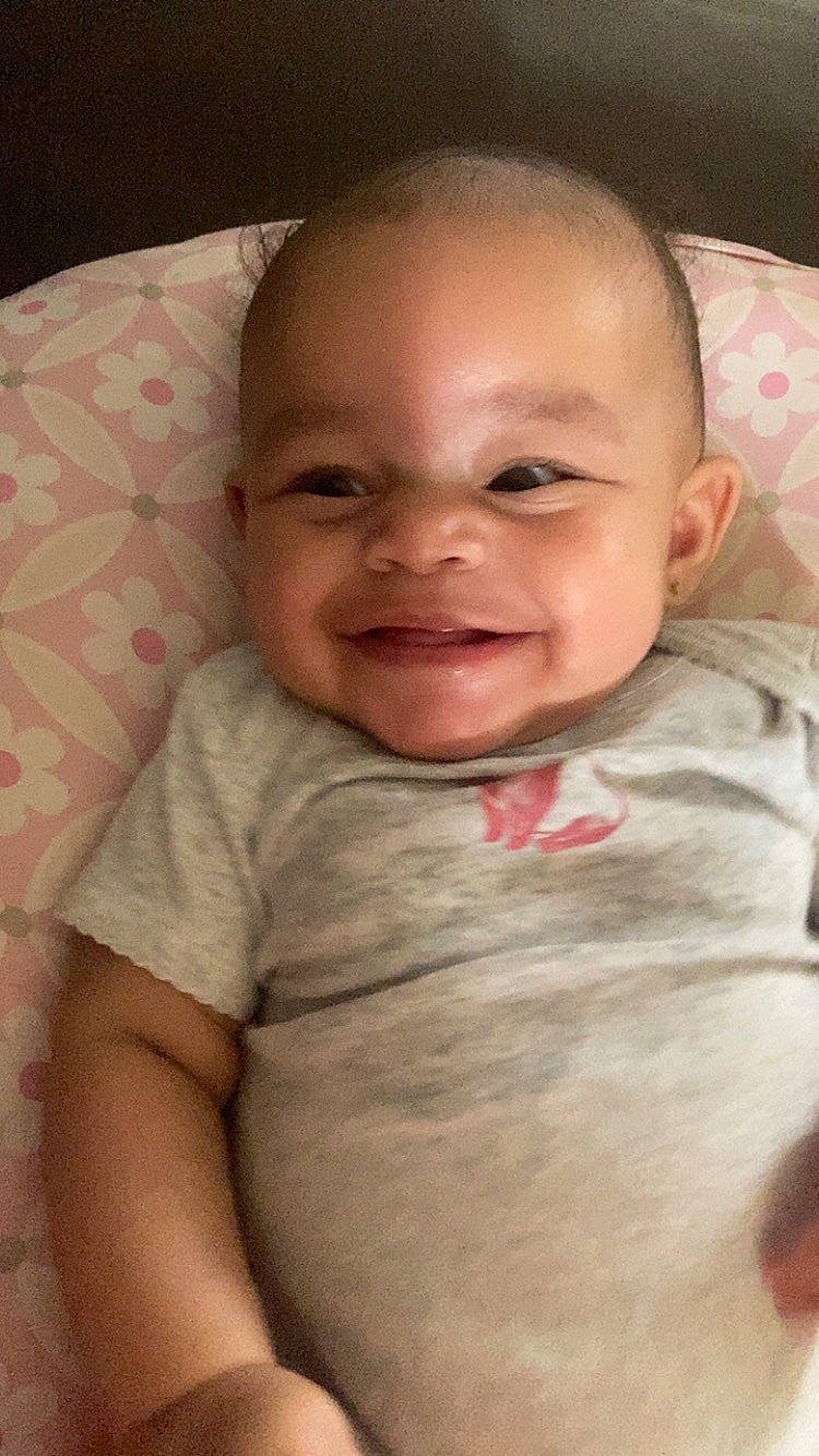 Arielle joined the competition — help win amazing prizes! baby, baby_toddler_clothing, cheek, comfort, eyebrow, finger, gesture, happy, human_body, iris, jaw, joy, lip, mouth, neck, nose, person, skin, sleeve, smile