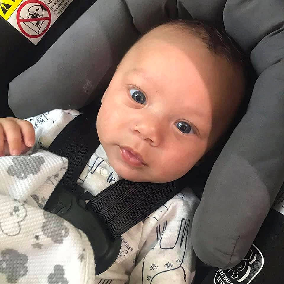 Kaydence joined the competition — help win amazing prizes! auto_part, baby, baby_toddler_clothing, car_seat, cheek, child, comfort, eyelash, facial_expression, finger, gesture, hairstyle, happy, nose, organ, person, skin, sleeve, thumb, toddler