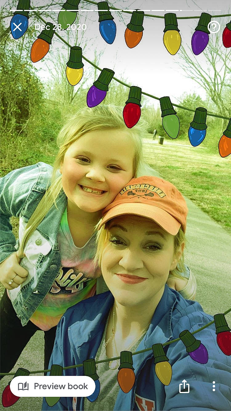 Audrina is registered to the contest to win money with this photo: balloon, cap, community, facial_expression, friendship, fun, grass, green, happy, headwear, joy, leaf, leisure, nature, people_in_nature, person, photograph, plant, smile, social_group
