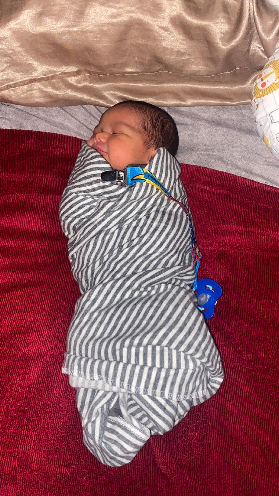 Kamari joined the competition — help win amazing prizes! baby, baby_products, baby_toddler_clothing, child, clothing, comfort, electric_blue, linens, magenta, pattern, person, room, sitting, sleeve, textile, toddler, wool, woolen, woven_fabric