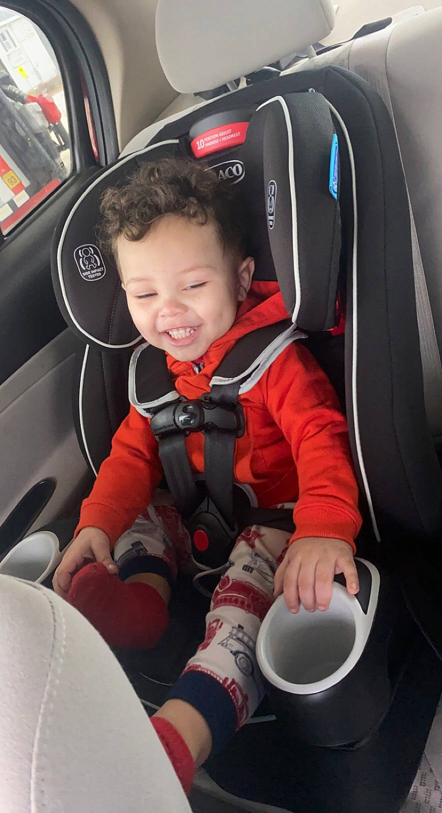 Lyric is registered to the contest to win money with this photo: auto_part, automotive_design, automotive_exterior, automotive_wheel_system, car, car_seat, car_seat_cover, comfort, head_restraint, joy, motor_vehicle, person, personal_luxury_car, seat_belt, smile, steering_part, steering_wheel, toddler, vehicle, vehicle_door