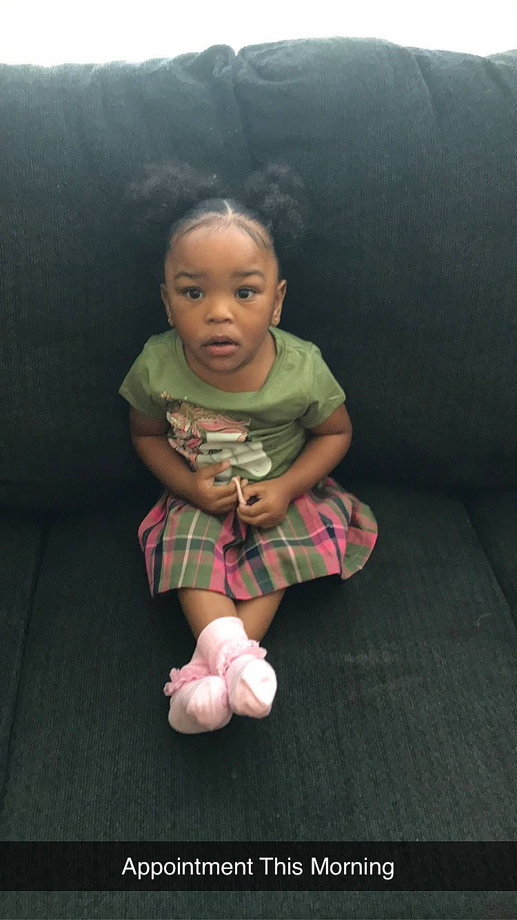 Zoey joined the competition — help win amazing prizes! baby_toddler_clothing, cheek, child, darkness, flash_photography, floor, flooring, foot, fun, human_leg, knee, magenta, pattern, person, plaid, room, sitting, skin, sleeve, sock