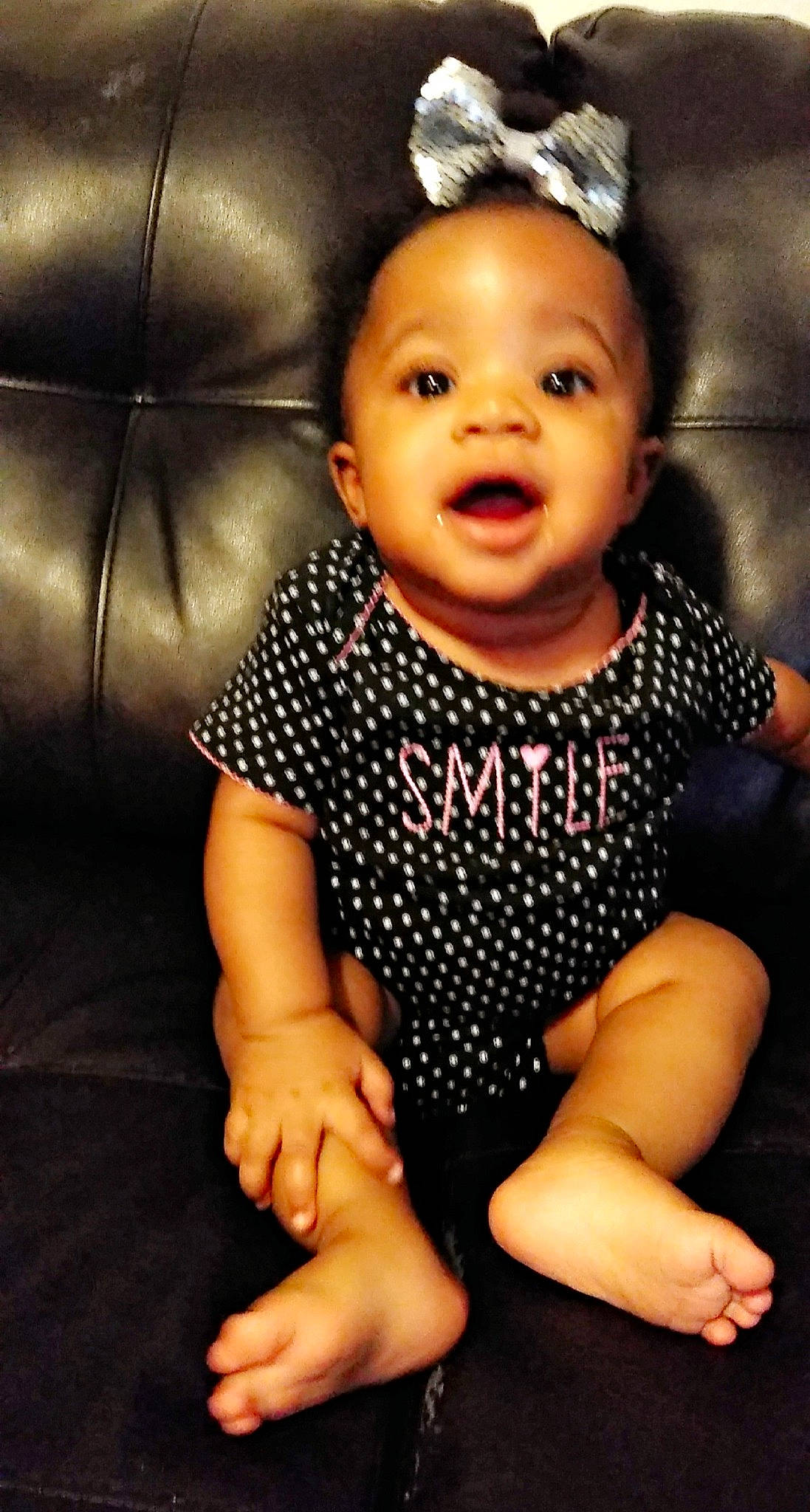 Raygan joined the competition — help win amazing prizes! arm, baby, baby_toddler_clothing, beauty, cheek, child, child_model, design, face, finger, fun, hand, head, lip, pattern, person, polka_dot, sitting, skin, smile