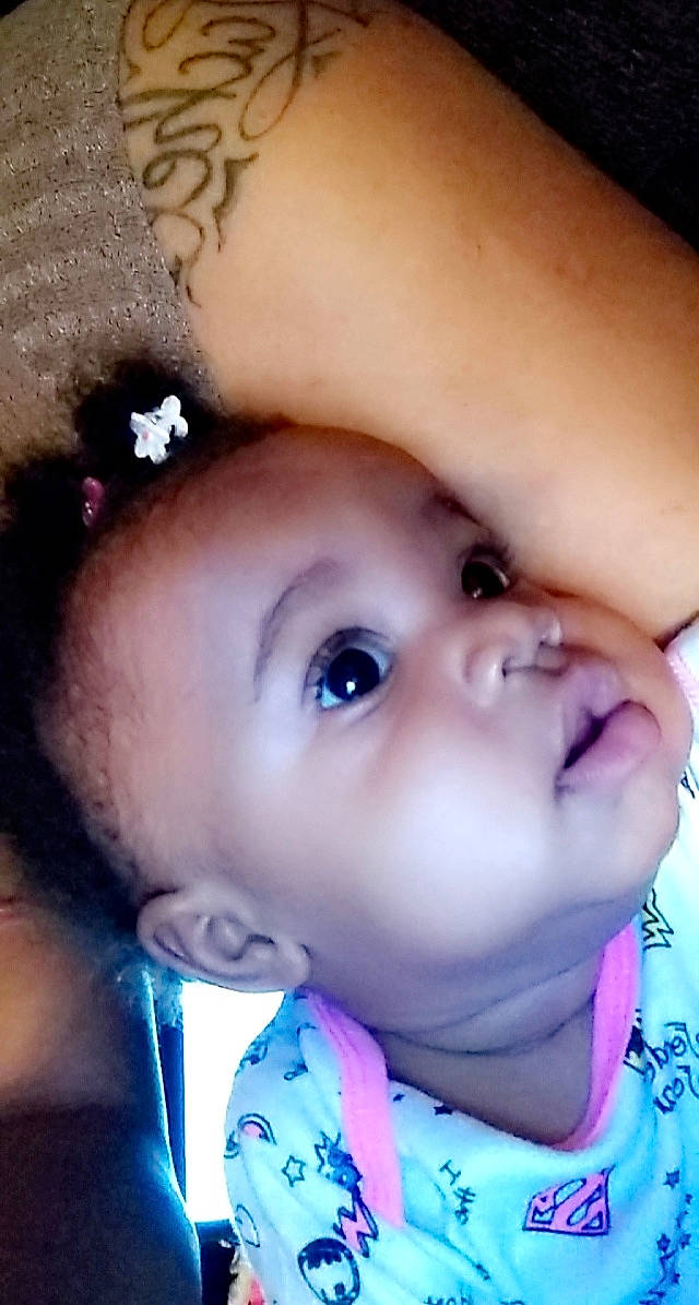 Raygan is registered to the contest to win money with this photo: baby, beauty, cheek, child, chin, close_up, ear, eye, eyebrow, eyelash, face, forehead, head, iris, lip, mouth, nose, person, photography, skin