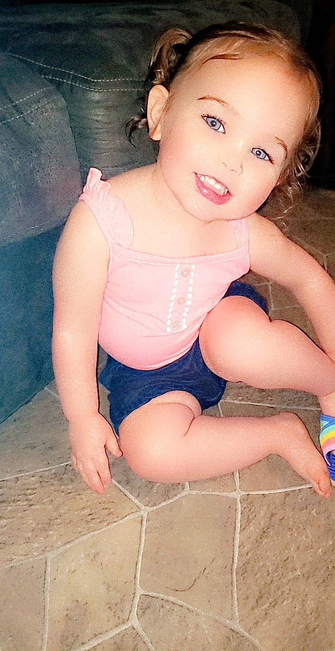 Kenzlee is registered to the contest to win money with this photo: baby_toddler_clothing, black_hair, cheek, chest, eye, flash_photography, fun, hair, happy, head, knee, leg, lip, neck, organ, person, pink, skin, thigh, toddler