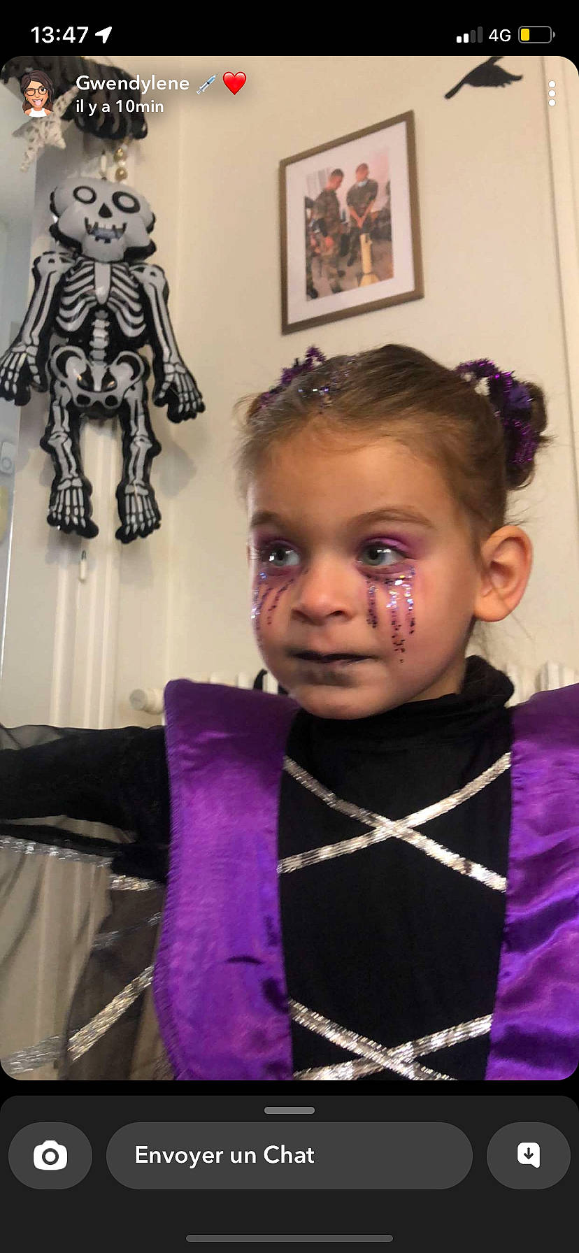 Elenna participe au concours pour gagner de l'argent avec cette photo : art, cheek, costume, event, fashion, fashion_accessory, fashion_design, formal_wear, fun, hairstyle, head, headgear, jewellery, magenta, outerwear, people, person, picture_frame, standing, toddler