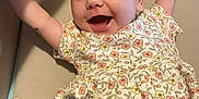 Cierra joined the competition — help win amazing prizes! arms_up, baby, child, closeup, comfort, cute, expression, face, floral_dress, happy, head, indoor, infant, joyful, light_skin, lying_down, pacifier, person, smiling, young_child