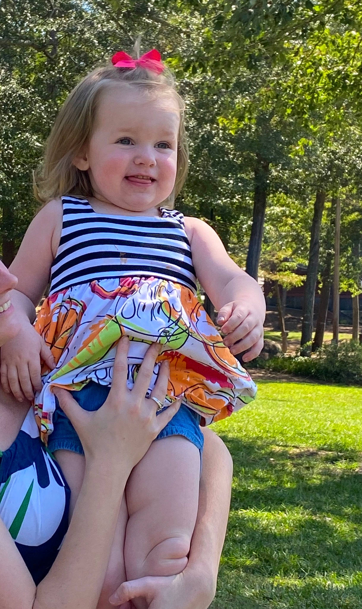 Olivia joined the competition — help win amazing prizes! abdomen, baby, blond, child, finger, fun, grass, joy, leg, person, plant, play, sitting, smile, summer, thigh, toddler, tree, vacation