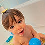 Timéo participe au concours pour gagner de l'argent avec cette photo : bath, bathroom, bathtub, blue_ball, child, cute, hair, happy, head, indoors, person, playful, skin, smiling, tiles, toddler, toy, water, wet, young_child