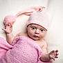 baby, child, cozy, cute, expression, hand, infant, knit, newborn, photography, pink_blanket, pink_hat, pom_pom, portrait, soft_texture, studio, warm, white_background, wide_eyes, wrapped