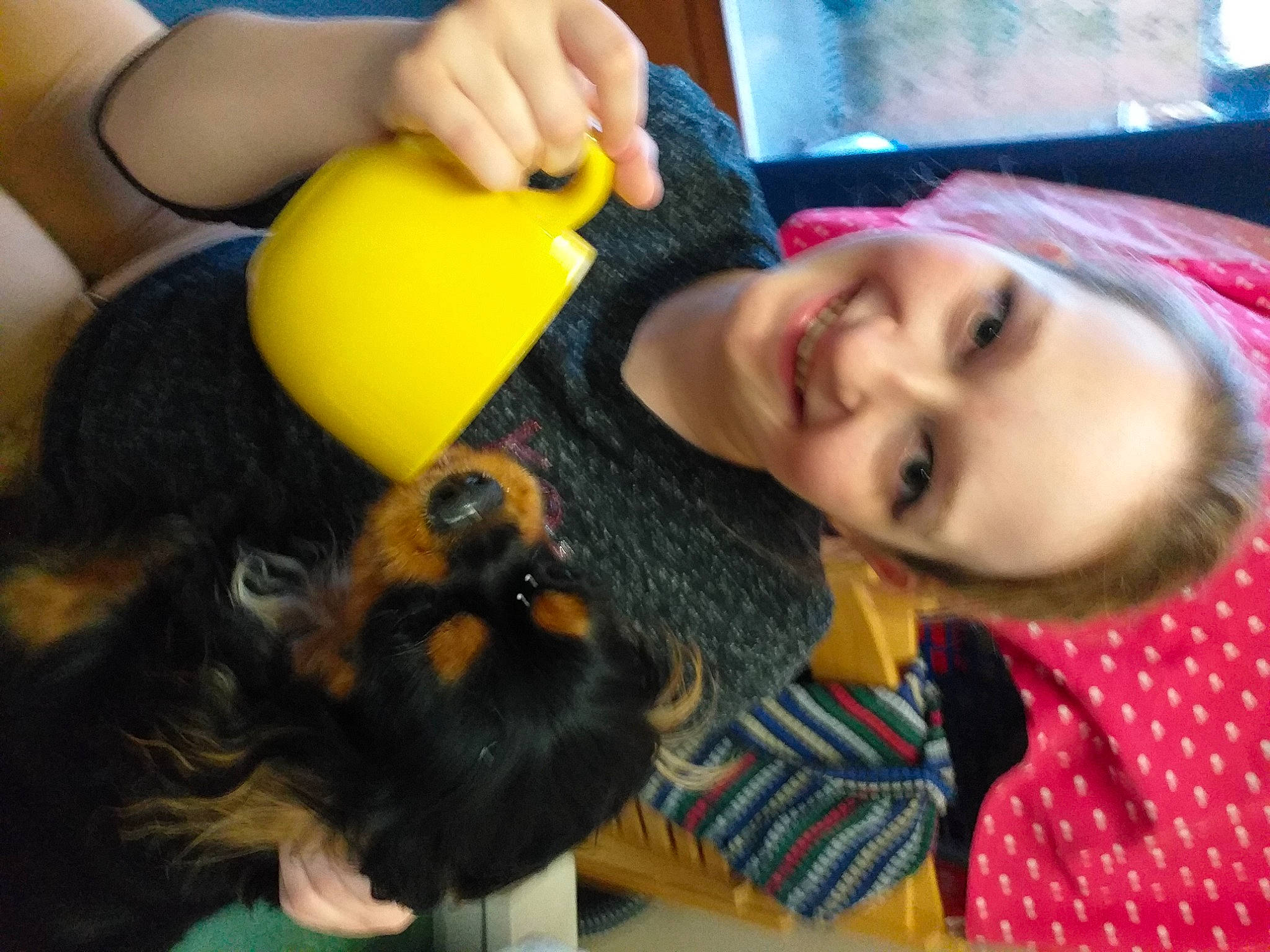 Flora participe au concours pour gagner de l'argent avec cette photo : child, companion_dog, dog_breed, ear, eyelash, fun, fur, gesture, hair_coloring, happy, mammal, nail, nose, pattern, selfie, skin, smile, t_shirt, thumb, vertebrate