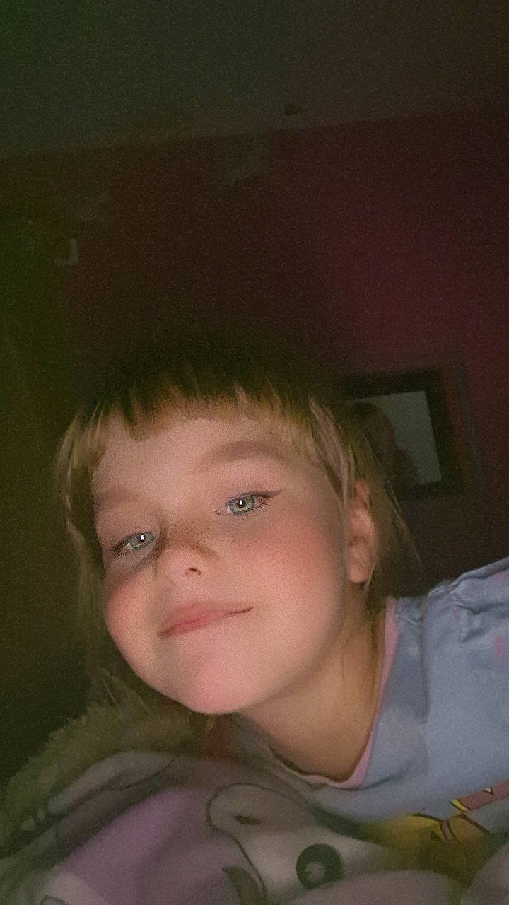 Chelsea is registered to the contest to win money with this photo: bangs, brown_hair, cheek, child, ear, eye, eyebrow, eyelash, flash_photography, forehead, fun, happy, iris, jaw, lip, nose, person, red_eye_effect, skin, smile