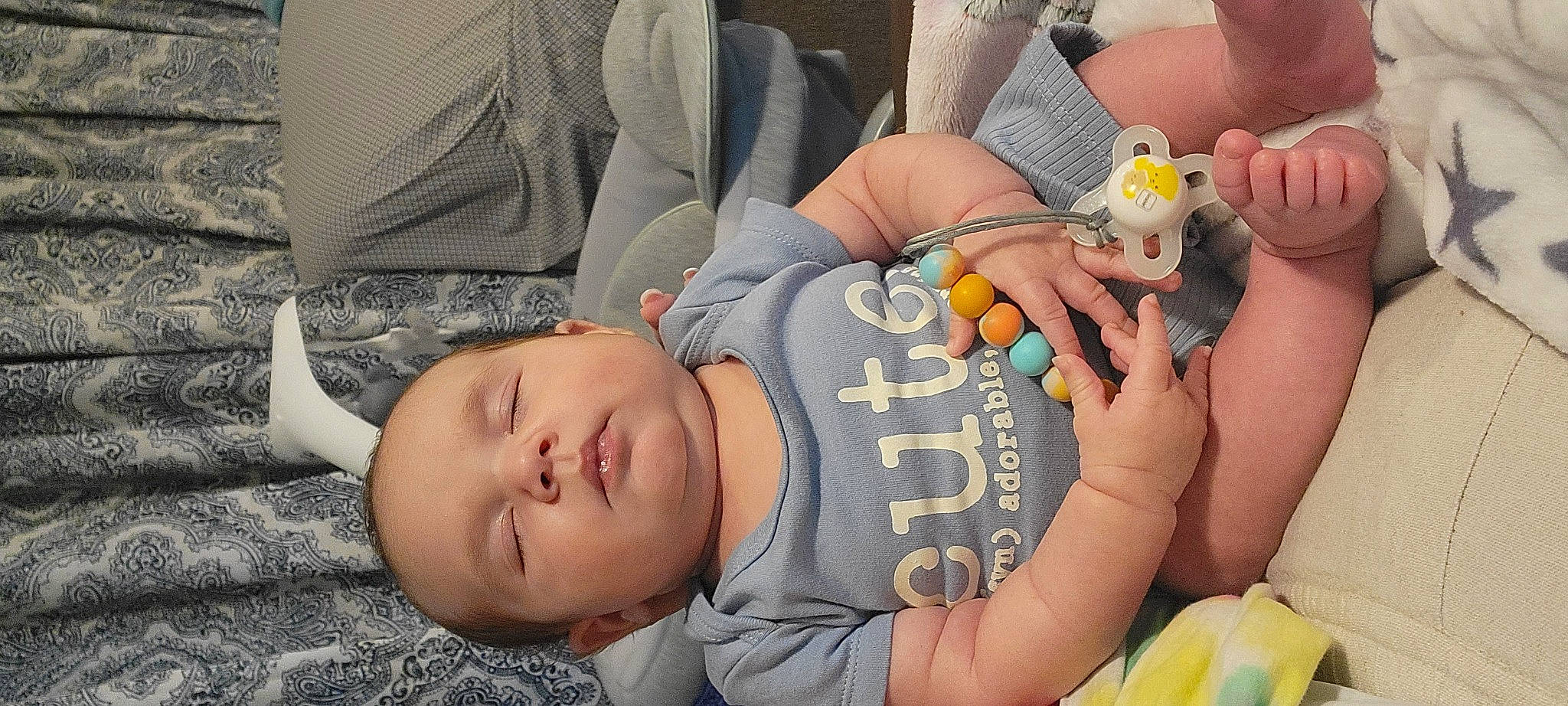 Zayden joined the competition — help win amazing prizes! baby, baby_products, baby_sleeping, baby_toddler_clothing, child, comfort, finger, fun, hand, human_body, interaction, mouth, nail, person, room, sitting, skin, textile, thumb, toddler