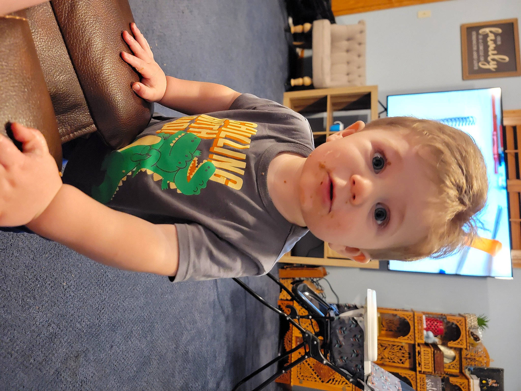 Kolter joined the competition — help win amazing prizes! baby, baby_products, bookcase, chair, child, fun, house, human_leg, knee, orange, person, play, room, shelf, shelving, sitting, smile, t_shirt, thigh, toddler