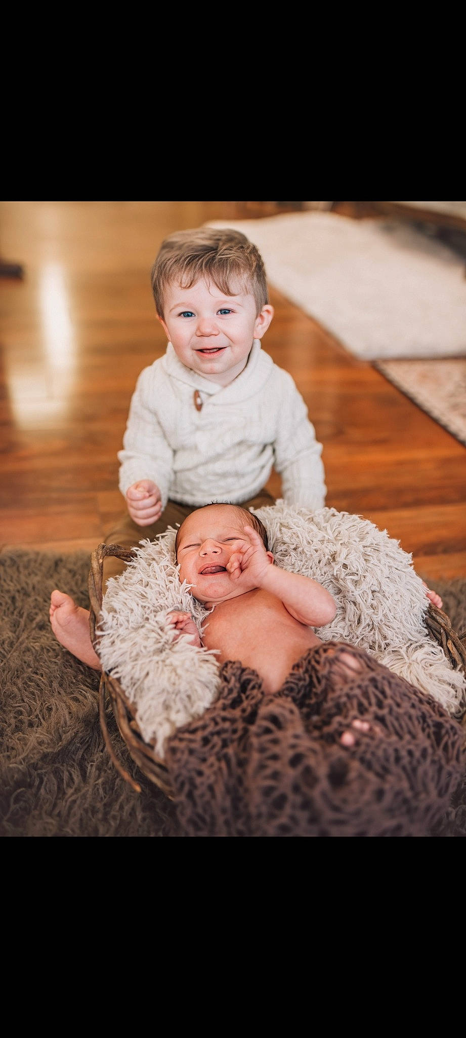 Kolter is registered to the contest to win money with this photo: baby, baby_toddler_clothing, cheek, child, comfort, dress, event, eye, flash_photography, flooring, fun, fur, grass, happy, head, joy, laugh, person, sitting, smile