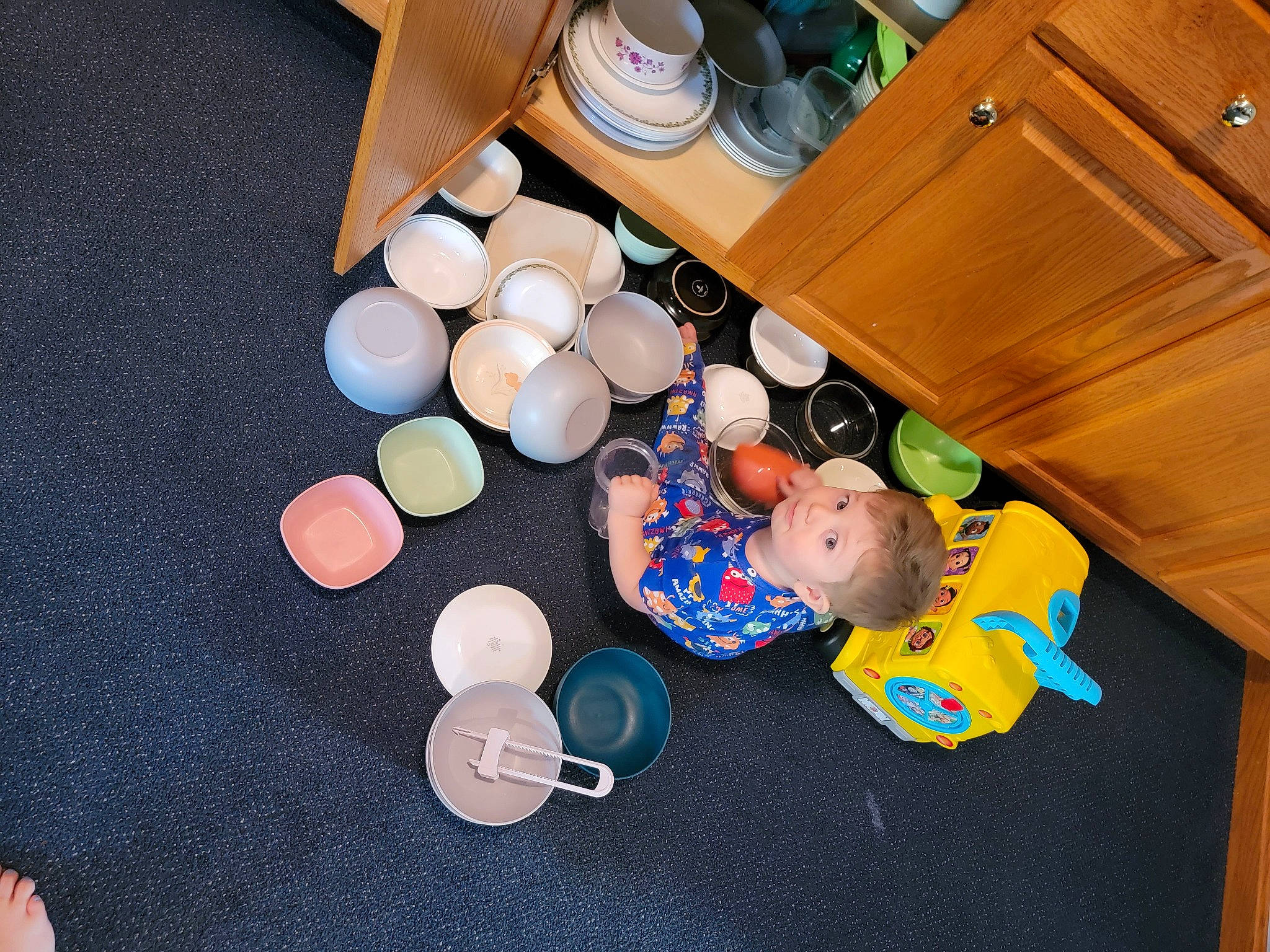 Kolter joined the competition — help win amazing prizes! baby, baby_products, baby_toddler_clothing, box, cabinetry, child, circle, comfort, drawer, event, flooring, hardwood, person, plastic, play, room, shipping_box, t_shirt, table, toddler